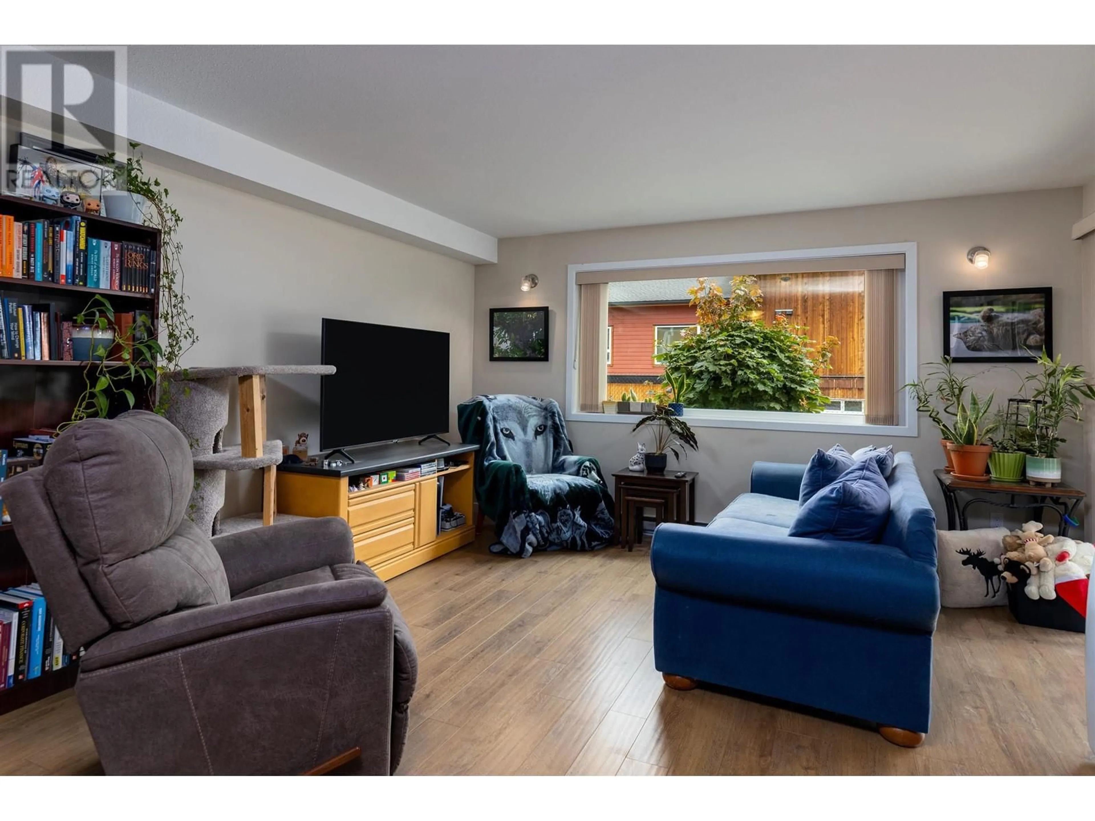 Living room with furniture, wood/laminate floor for 107 - 4719 DAVIS AVENUE, Terrace British Columbia V8G1Y1
