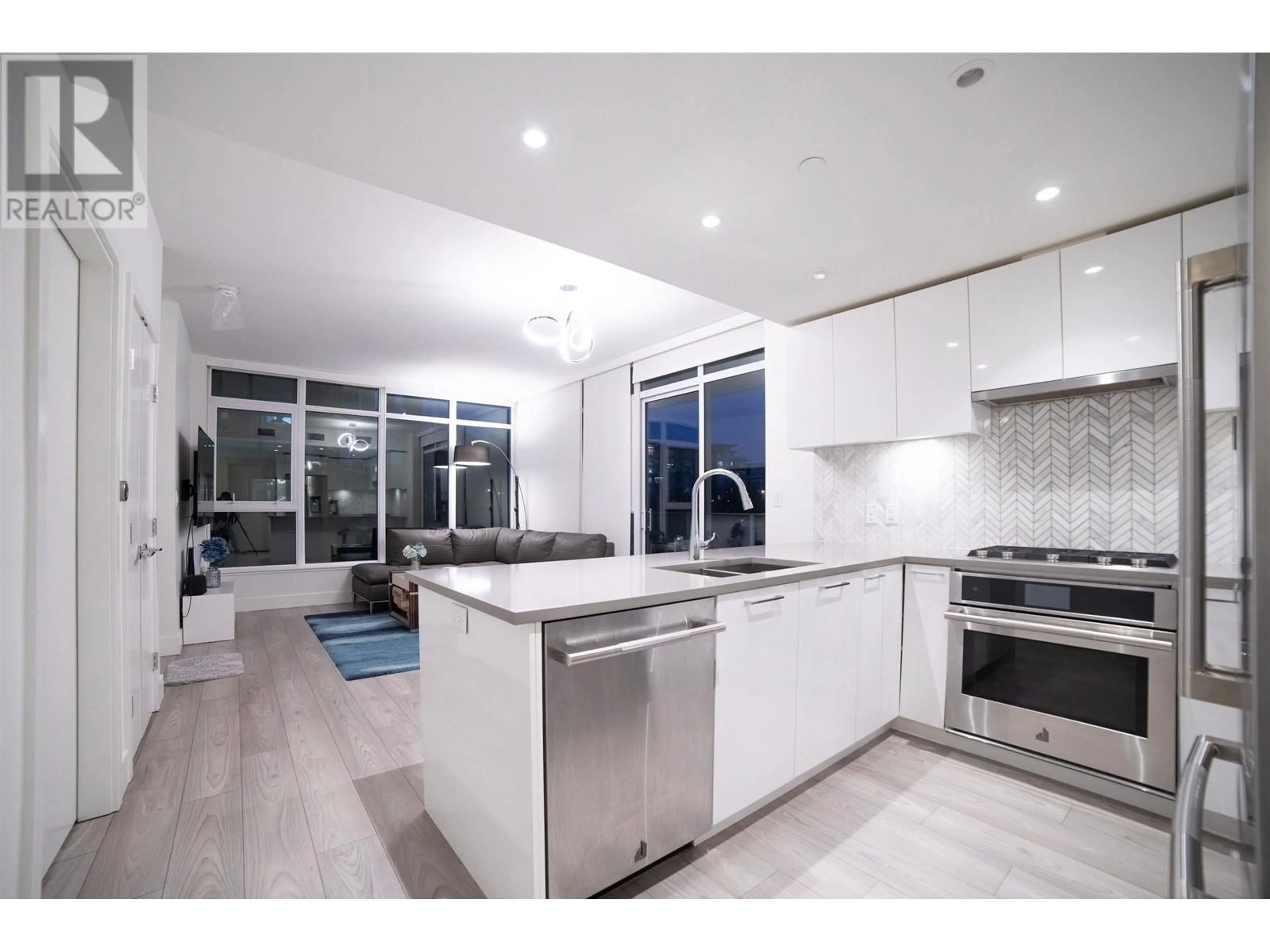 Open concept kitchen, ceramic/tile floor for 201 - 3581 KENT AVENUE, Vancouver British Columbia V5S0H6