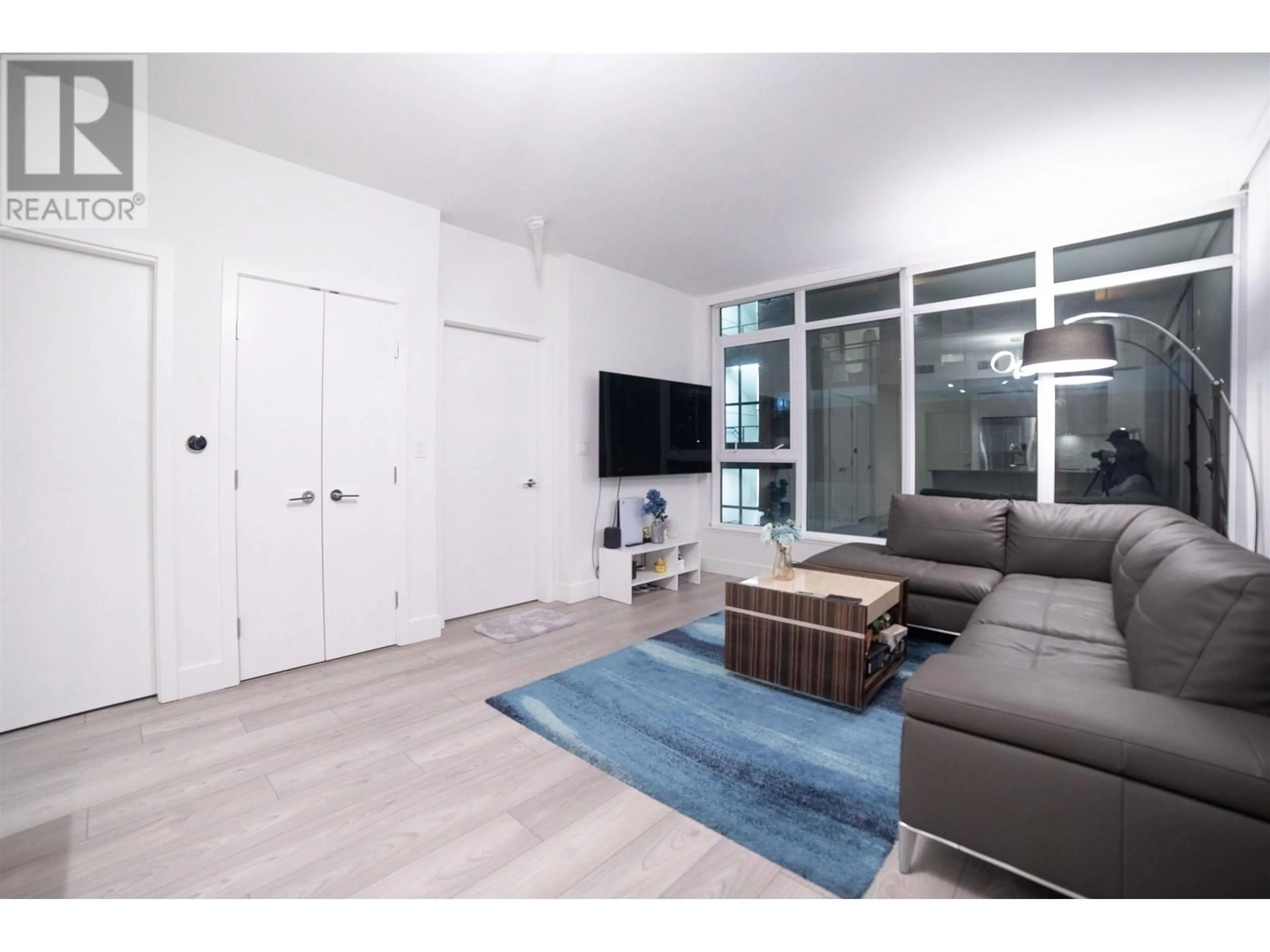Living room with furniture, unknown for 201 - 3581 KENT AVENUE, Vancouver British Columbia V5S0H6