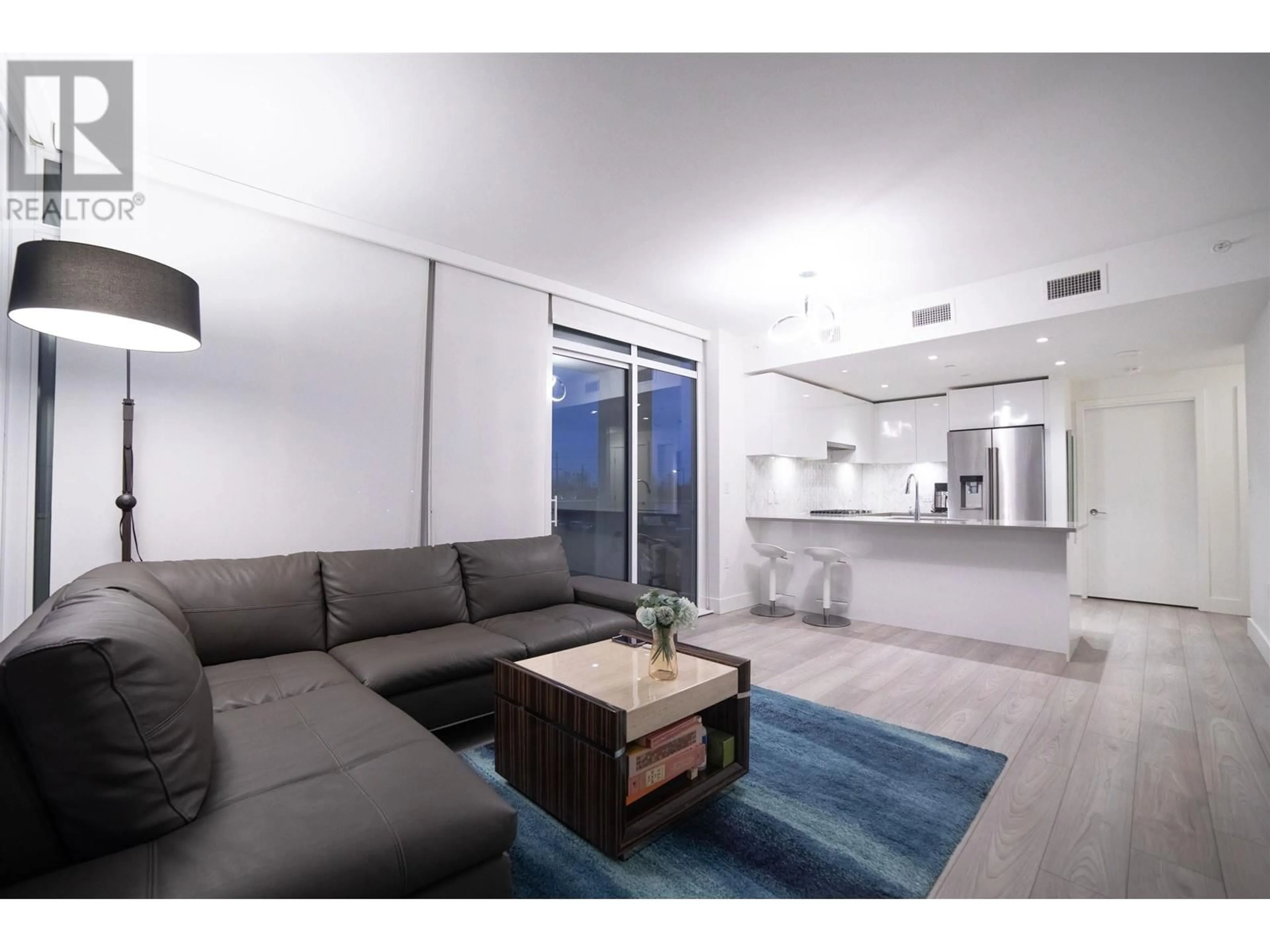 Living room with furniture, unknown for 201 - 3581 KENT AVENUE, Vancouver British Columbia V5S0H6