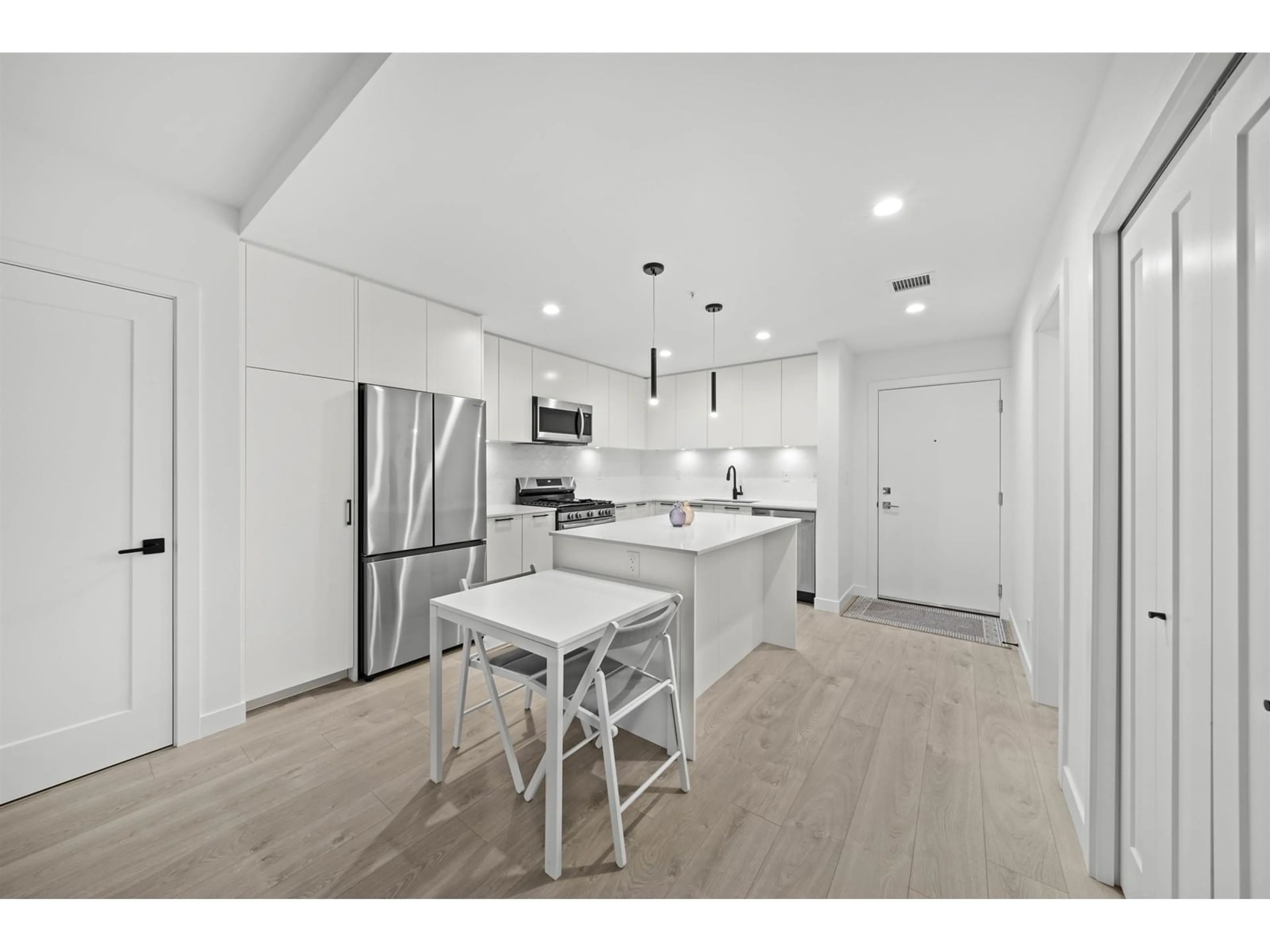 Open concept kitchen, unknown for 406 - 8379 201, Langley British Columbia V2Y3S6