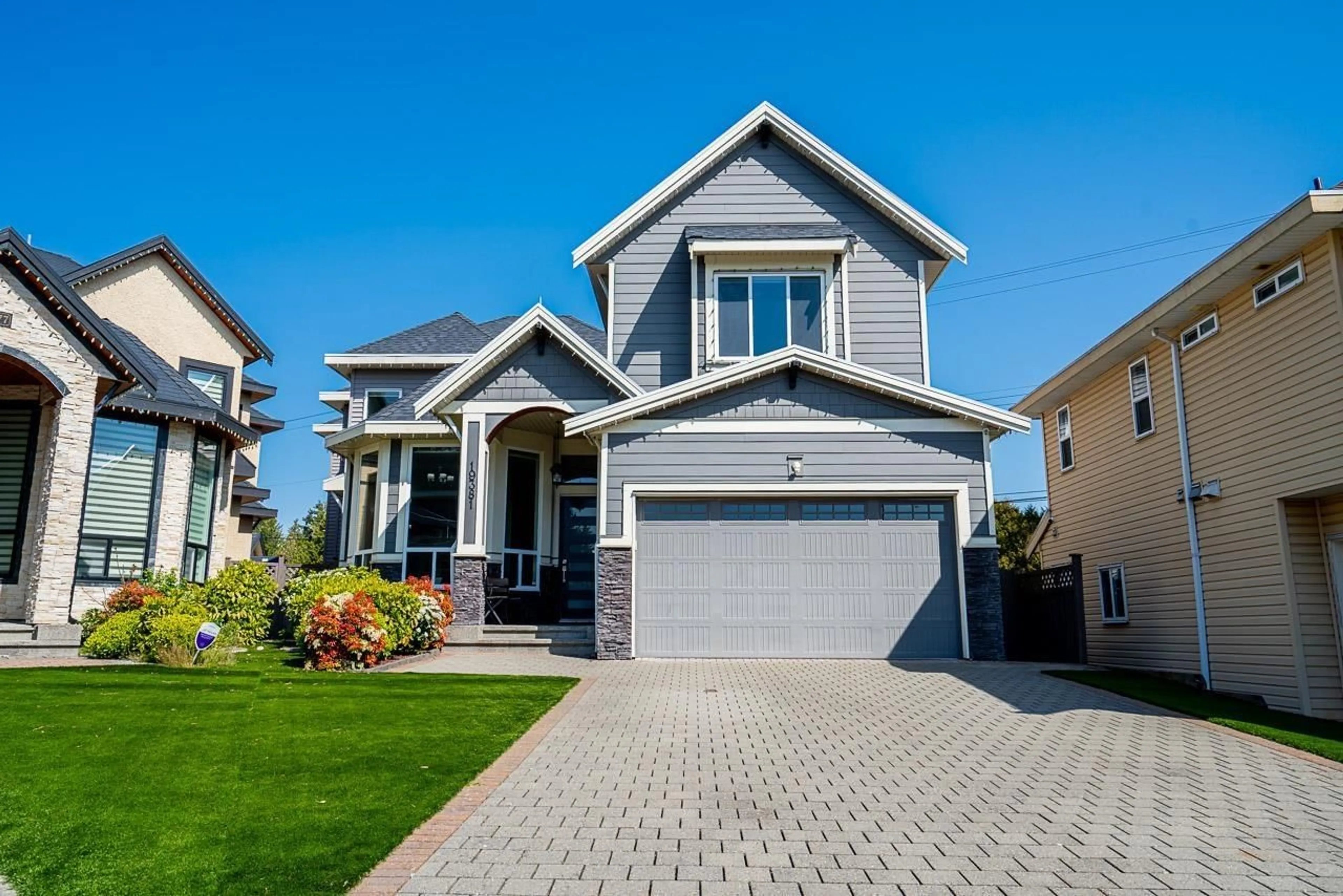 Home with vinyl exterior material, street for 19381 62, Surrey British Columbia V3S7L4