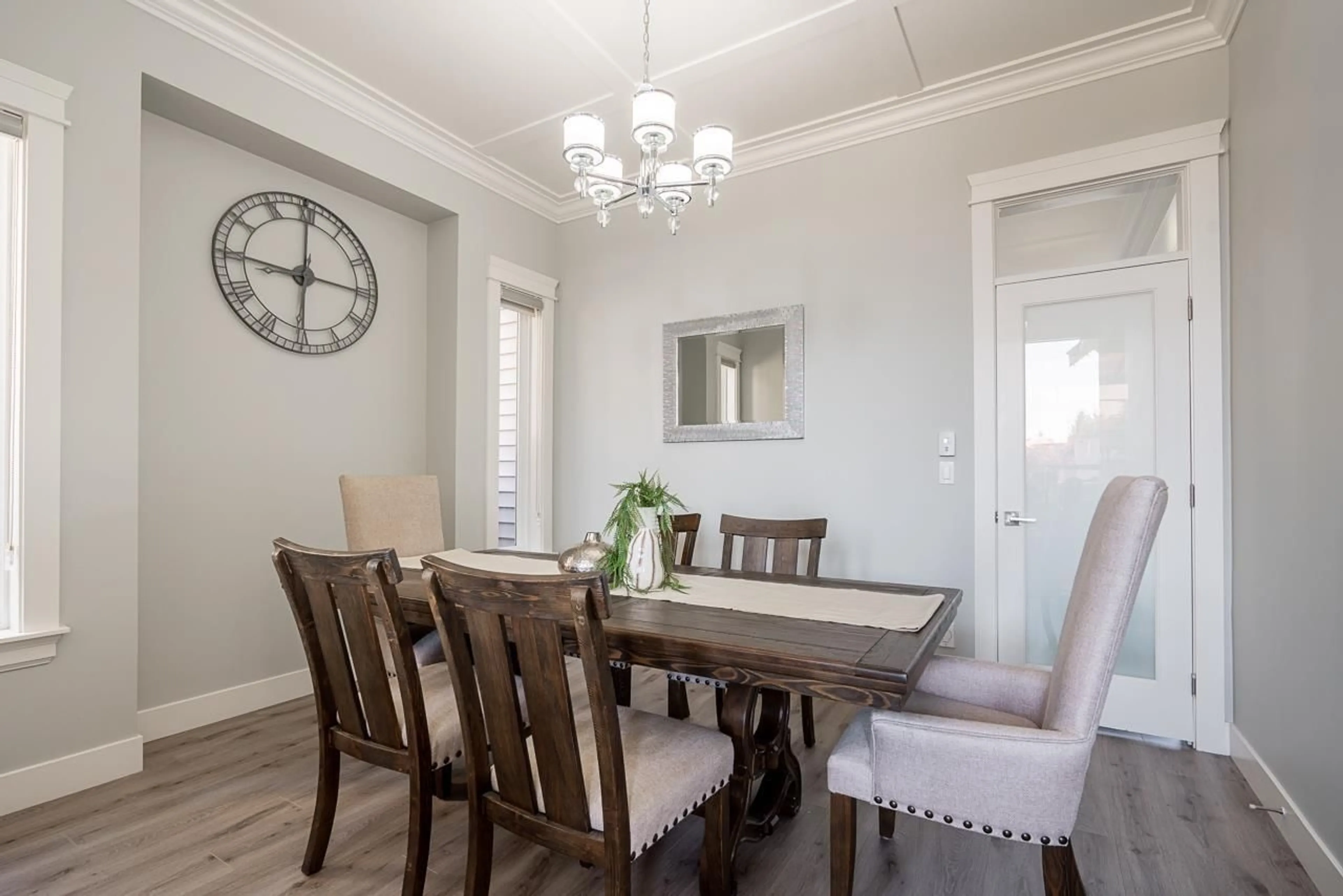 Dining room, wood/laminate floor for 19381 62, Surrey British Columbia V3S7L4