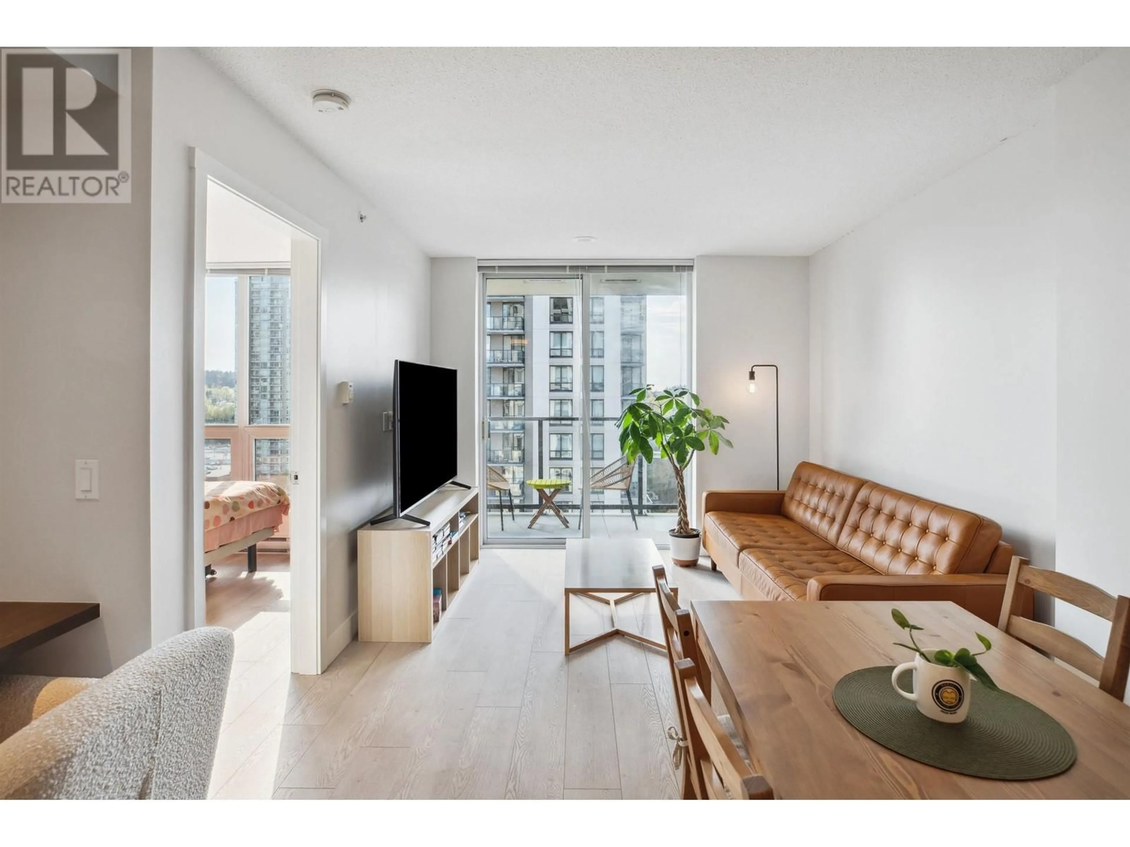 Living room with furniture, unknown for 1708 - 3007 GLEN DRIVE, Coquitlam British Columbia V3B0L8
