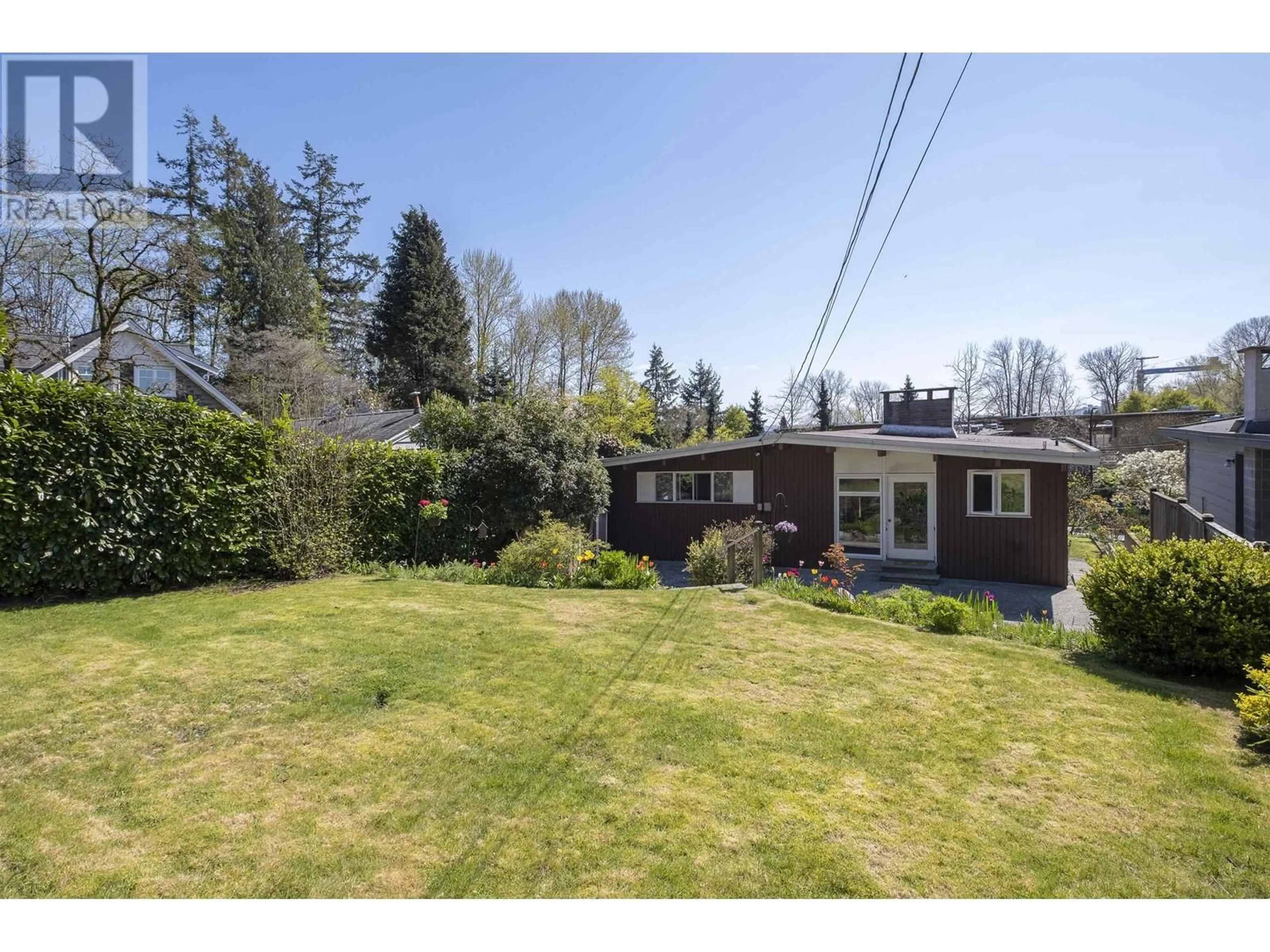 A pic from outside/outdoor area/front of a property/back of a property/a pic from drone, street for 1008 17TH STREET, North Vancouver British Columbia V7P3C5