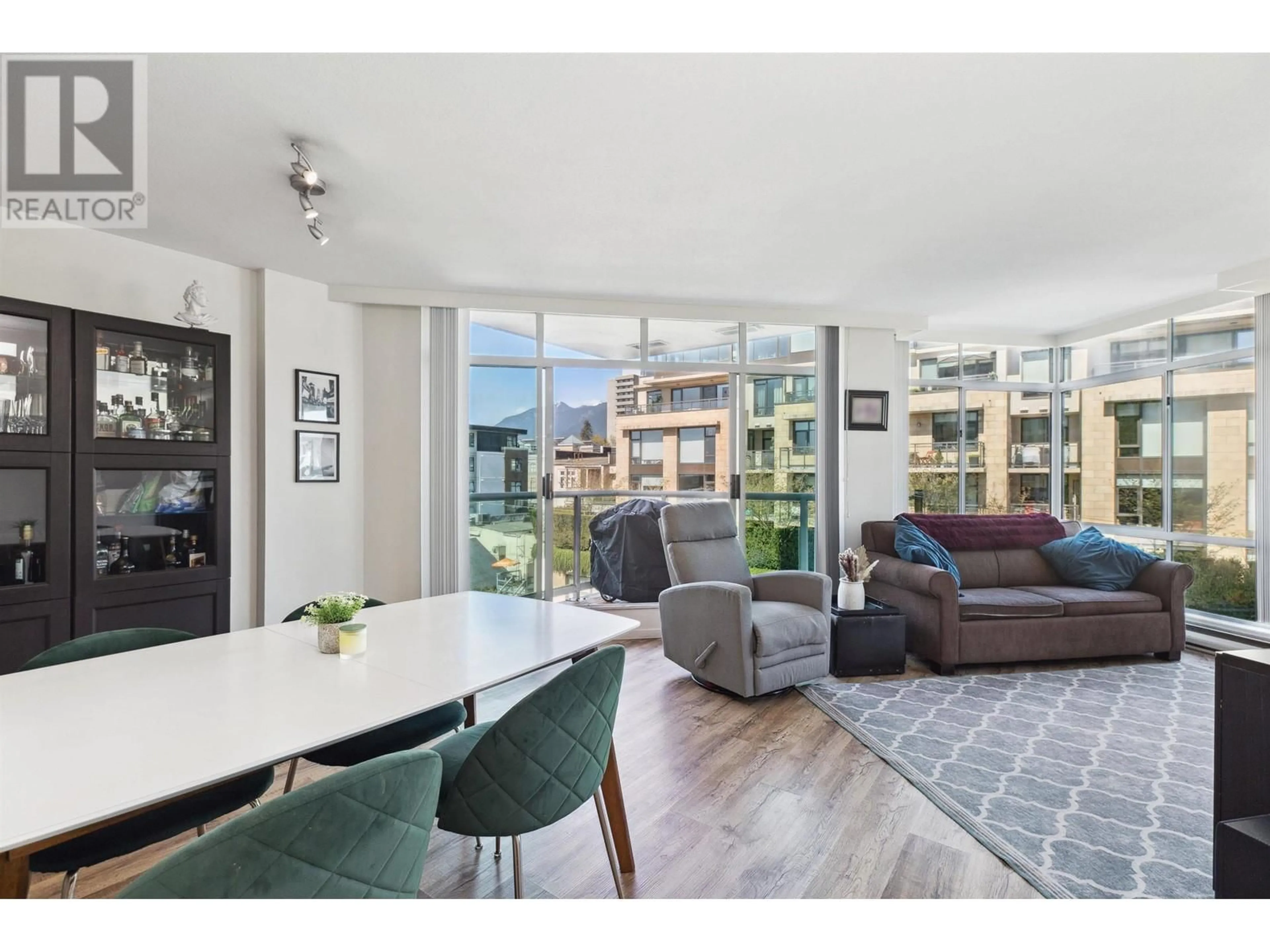 Living room with furniture, unknown for 703 - 130 2ND STREET, North Vancouver British Columbia V7L1C3
