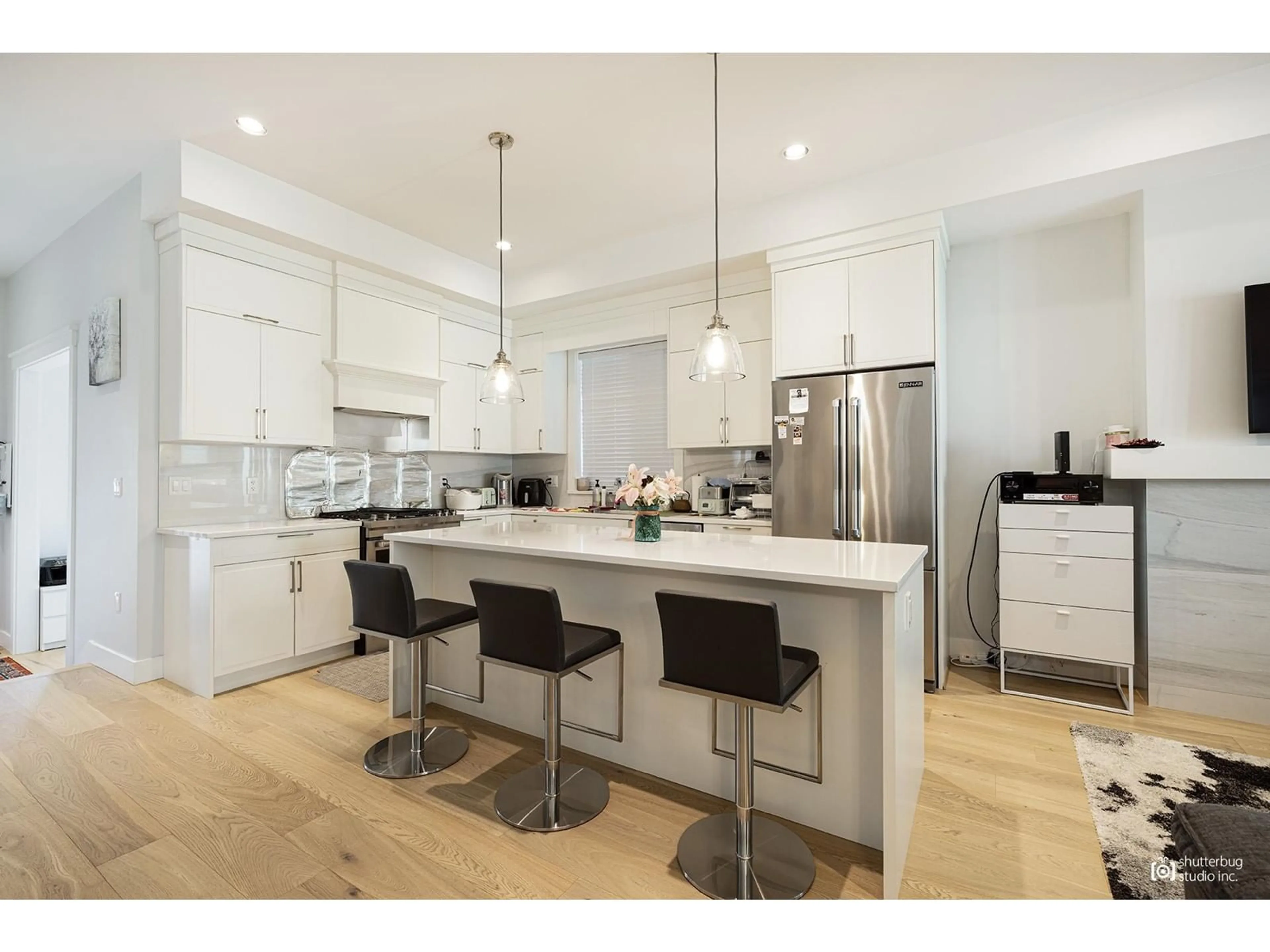 Open concept kitchen, wood/laminate floor for 16475 21A, Surrey British Columbia V3Z0V5