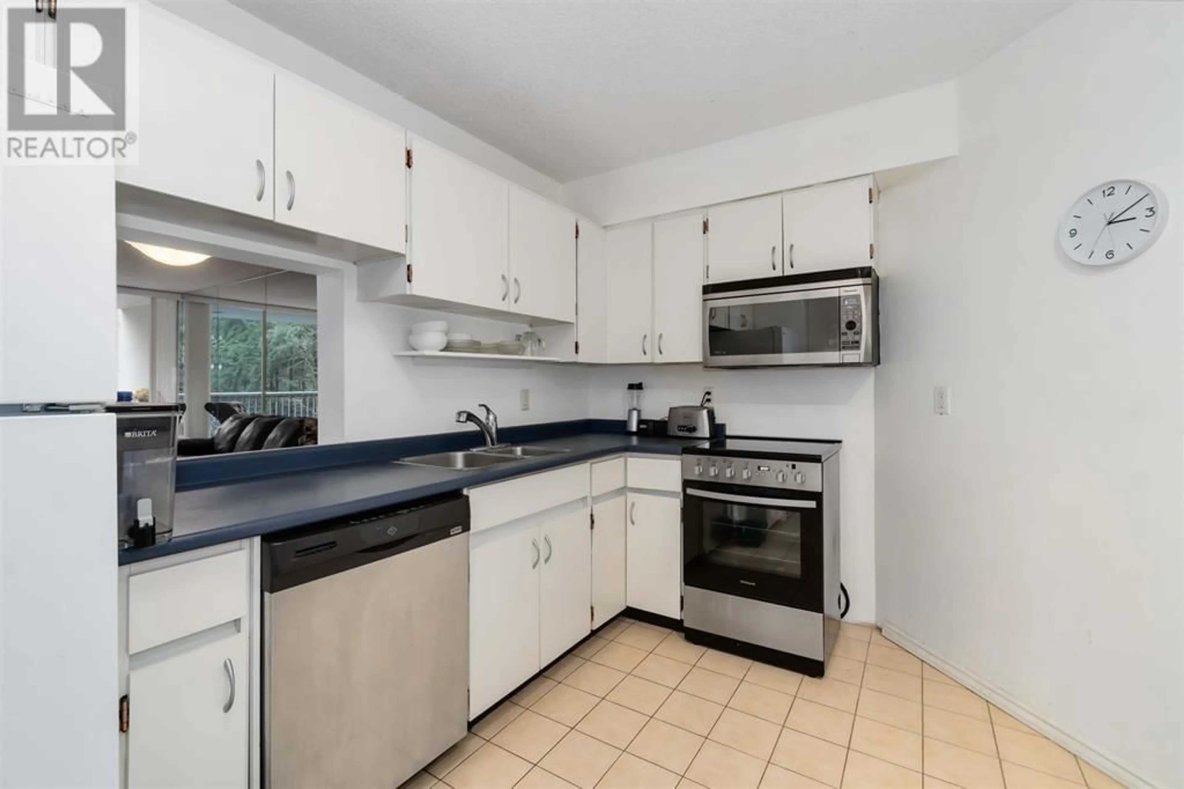 Standard kitchen, ceramic/tile floor for 405 - 2024 FULLERTON AVENUE, North Vancouver British Columbia V7P3G4