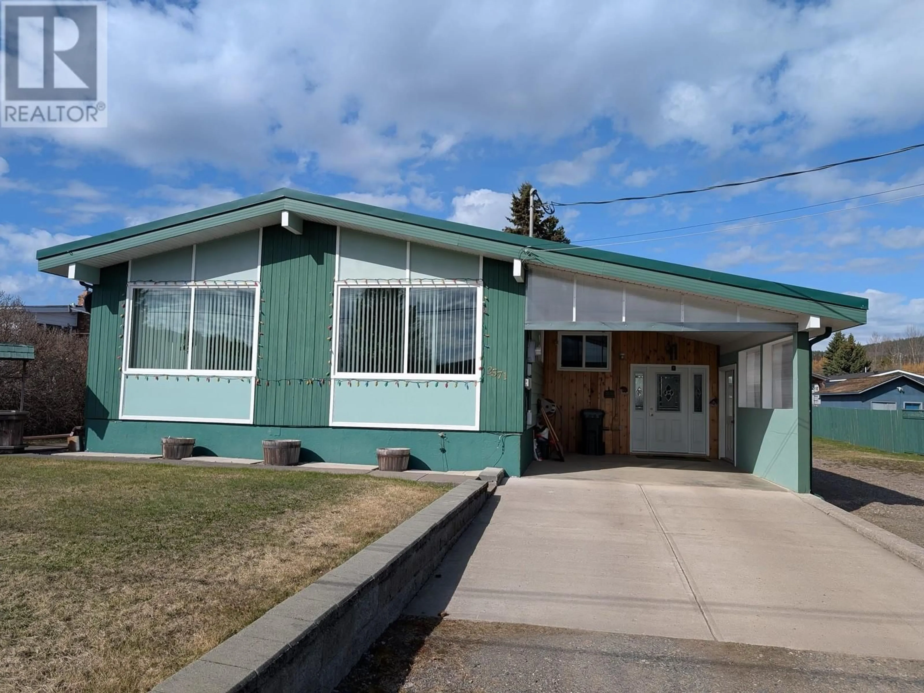 Home with vinyl exterior material, street for 2571 DOMINION AVENUE, Houston British Columbia V0J1Z0
