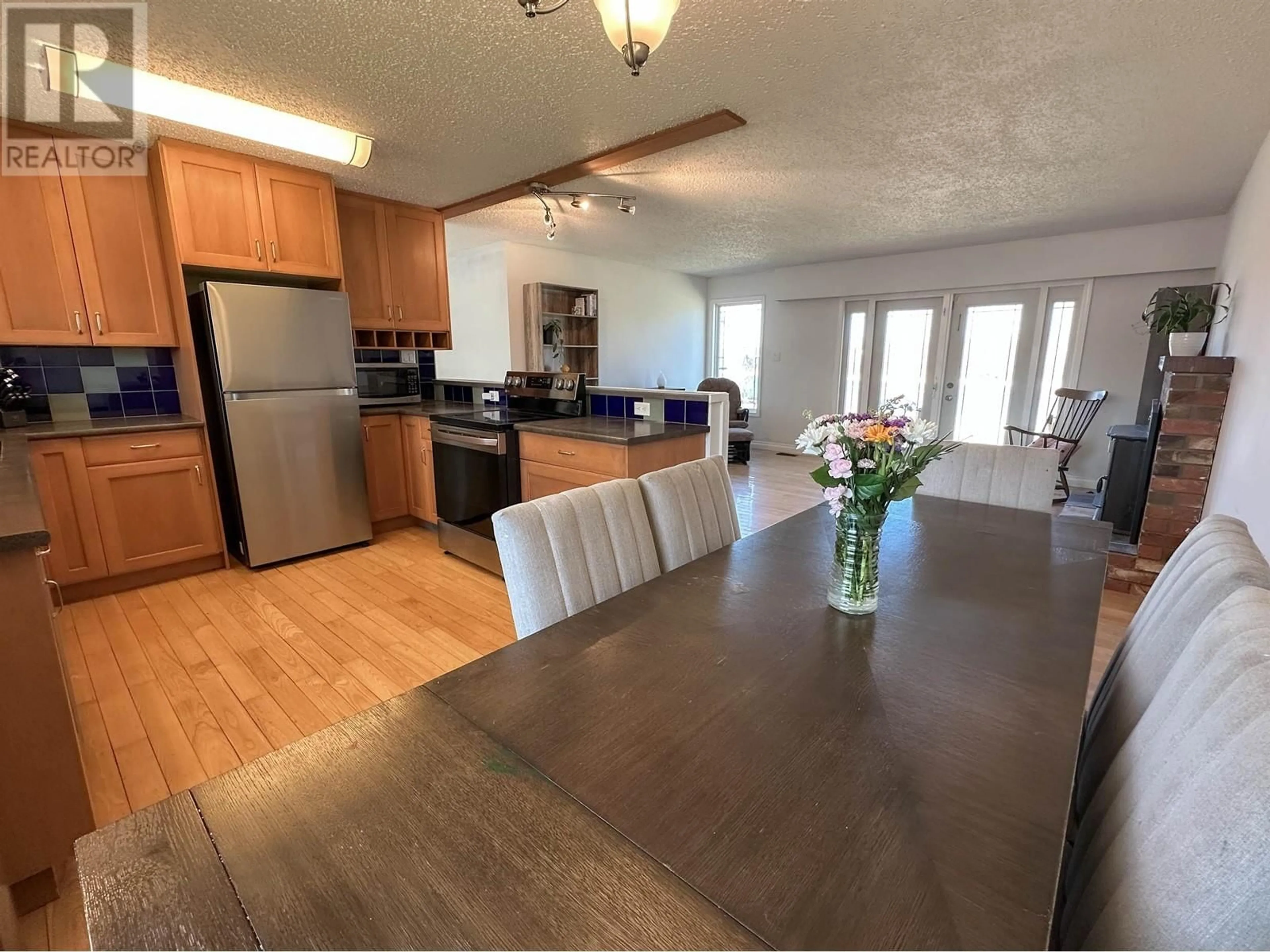 Open concept kitchen, wood/laminate floor for 2759 RIVERVIEW DRIVE, Vanderhoof British Columbia V0J3A0