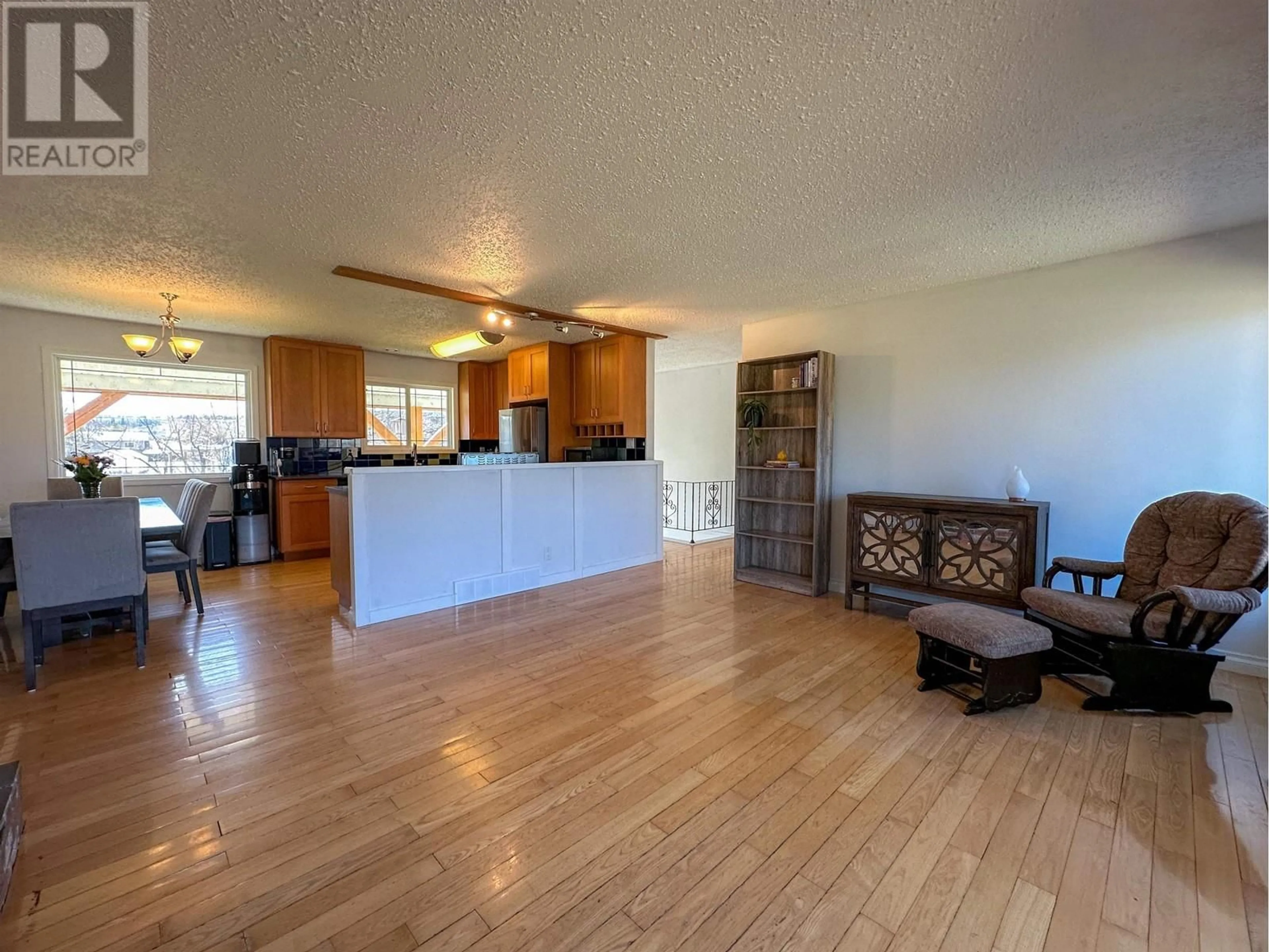Open concept kitchen, wood/laminate floor for 2759 RIVERVIEW DRIVE, Vanderhoof British Columbia V0J3A0
