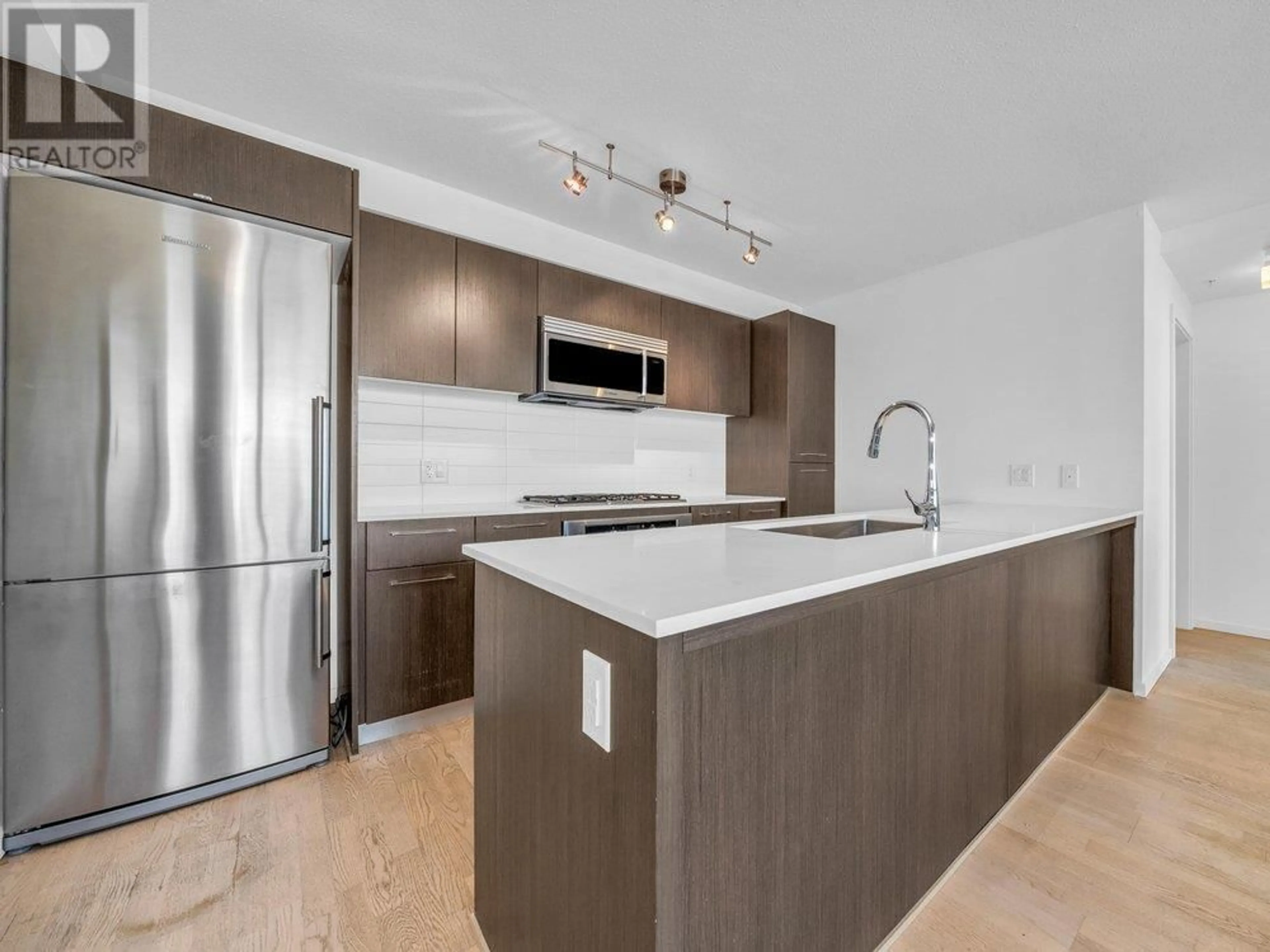 Open concept kitchen, unknown for 1801 - 7979 FIRBRIDGE WAY, Richmond British Columbia V6X0K7