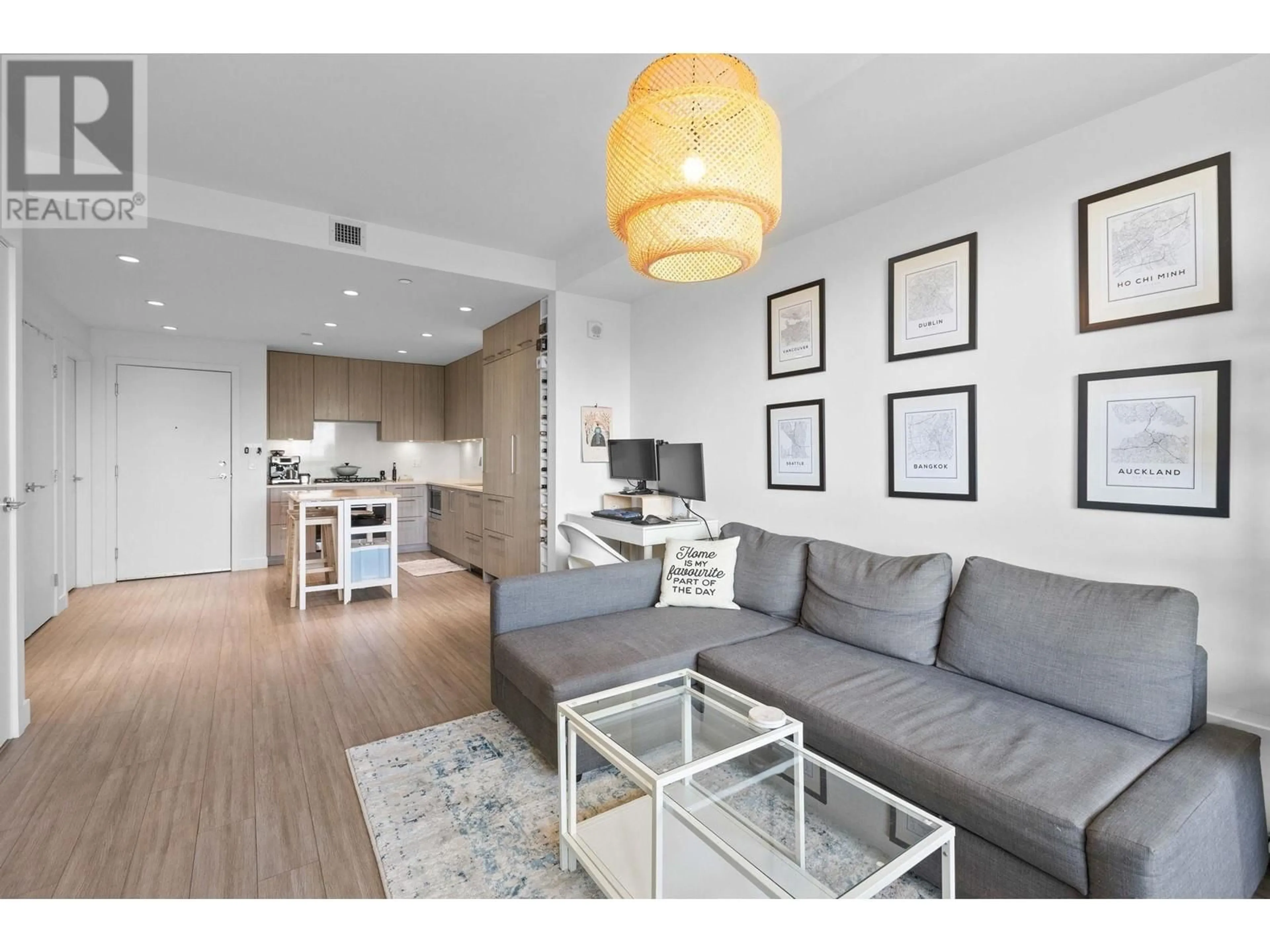 Living room with furniture, wood/laminate floor for 309 - 747 3RD STREET, North Vancouver British Columbia V7L1G8