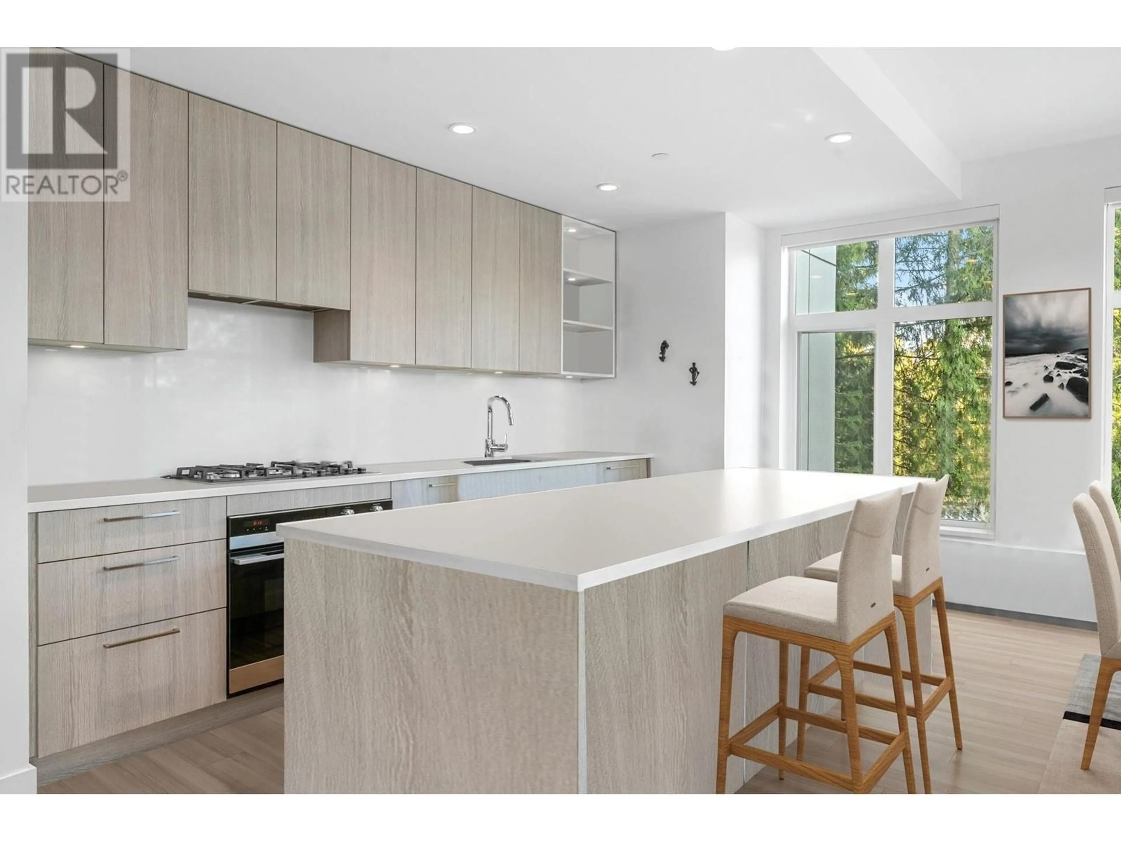 Open concept kitchen, unknown for 211 - 747 3RD STREET, North Vancouver British Columbia V7L1G8