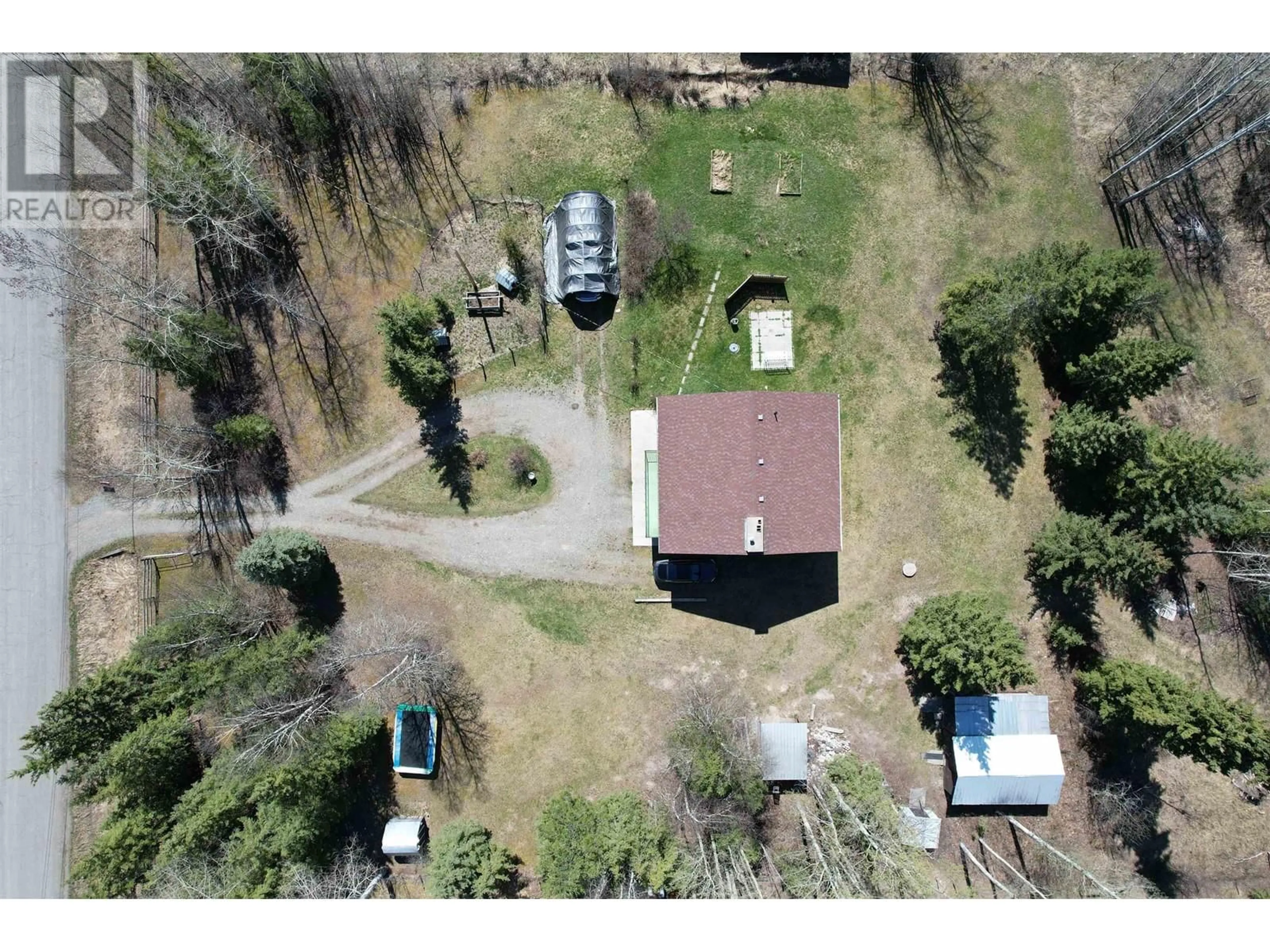 A pic from outside/outdoor area/front of a property/back of a property/a pic from drone, unknown for 911 HESKETH ROAD, Quesnel British Columbia V2J7H6