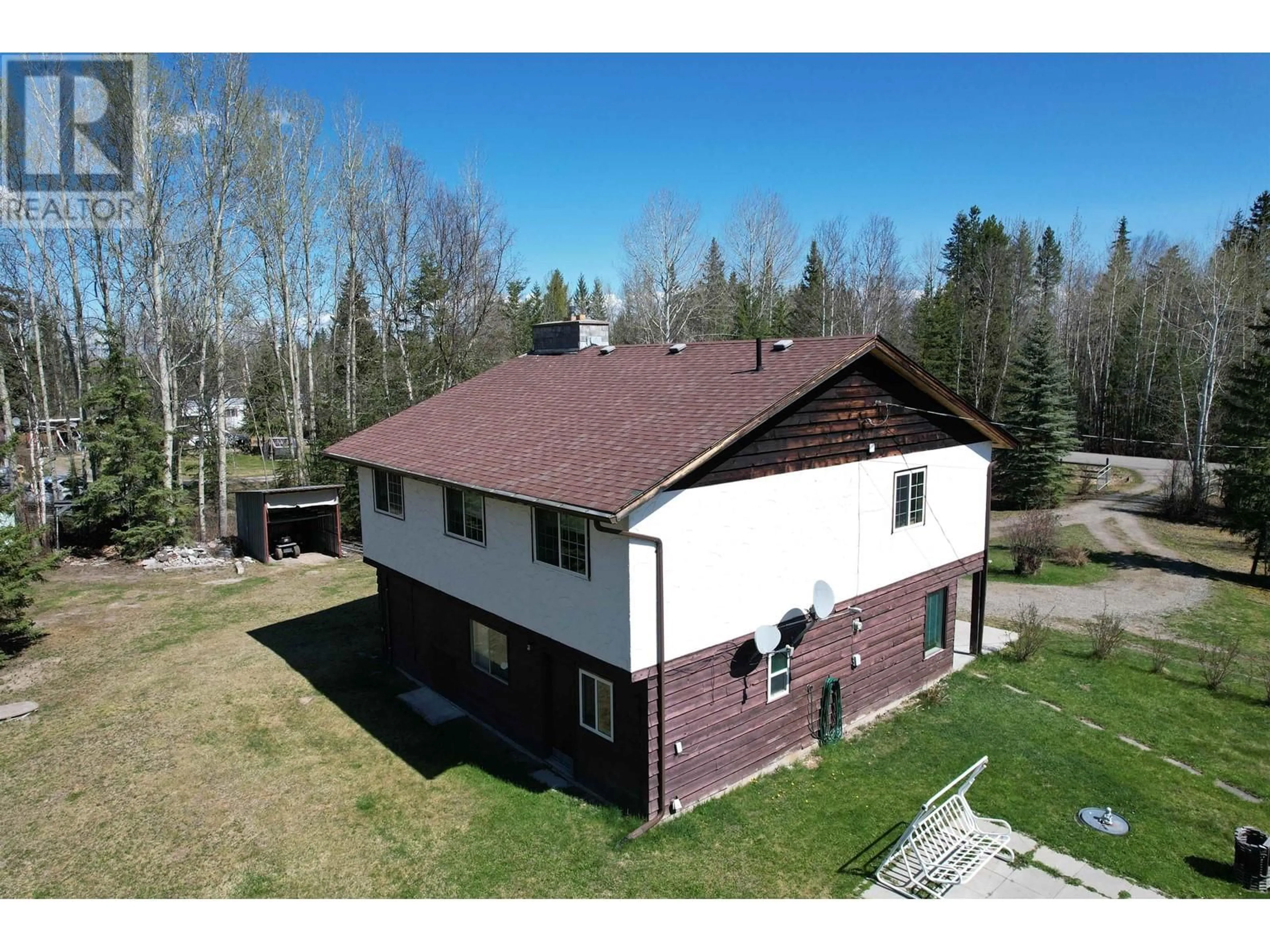A pic from outside/outdoor area/front of a property/back of a property/a pic from drone, unknown for 911 HESKETH ROAD, Quesnel British Columbia V2J7H6