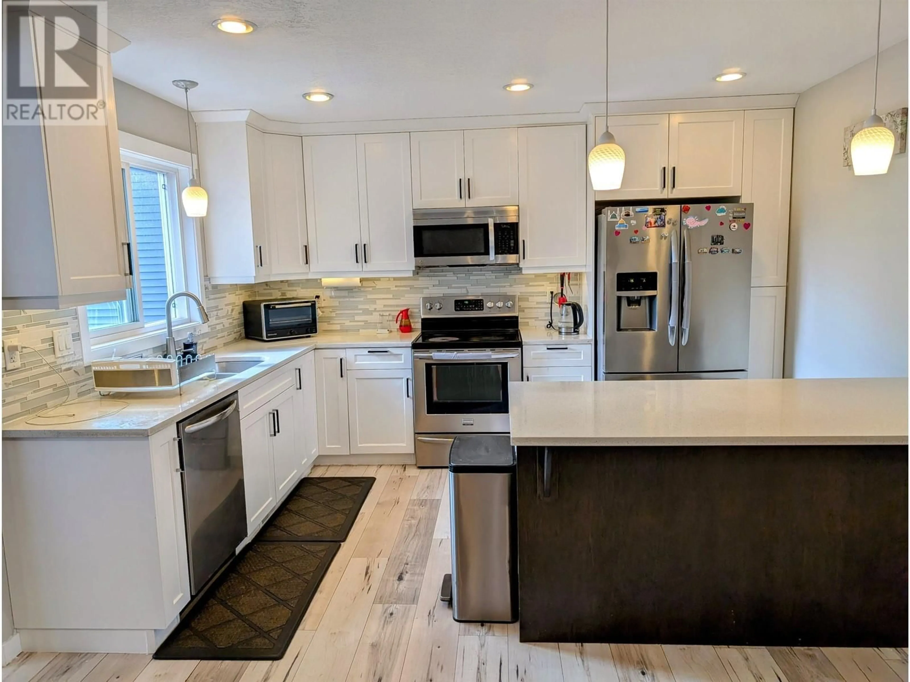 Open concept kitchen, unknown for 7669 CREEKSIDE WAY, Prince George British Columbia V2N0C2