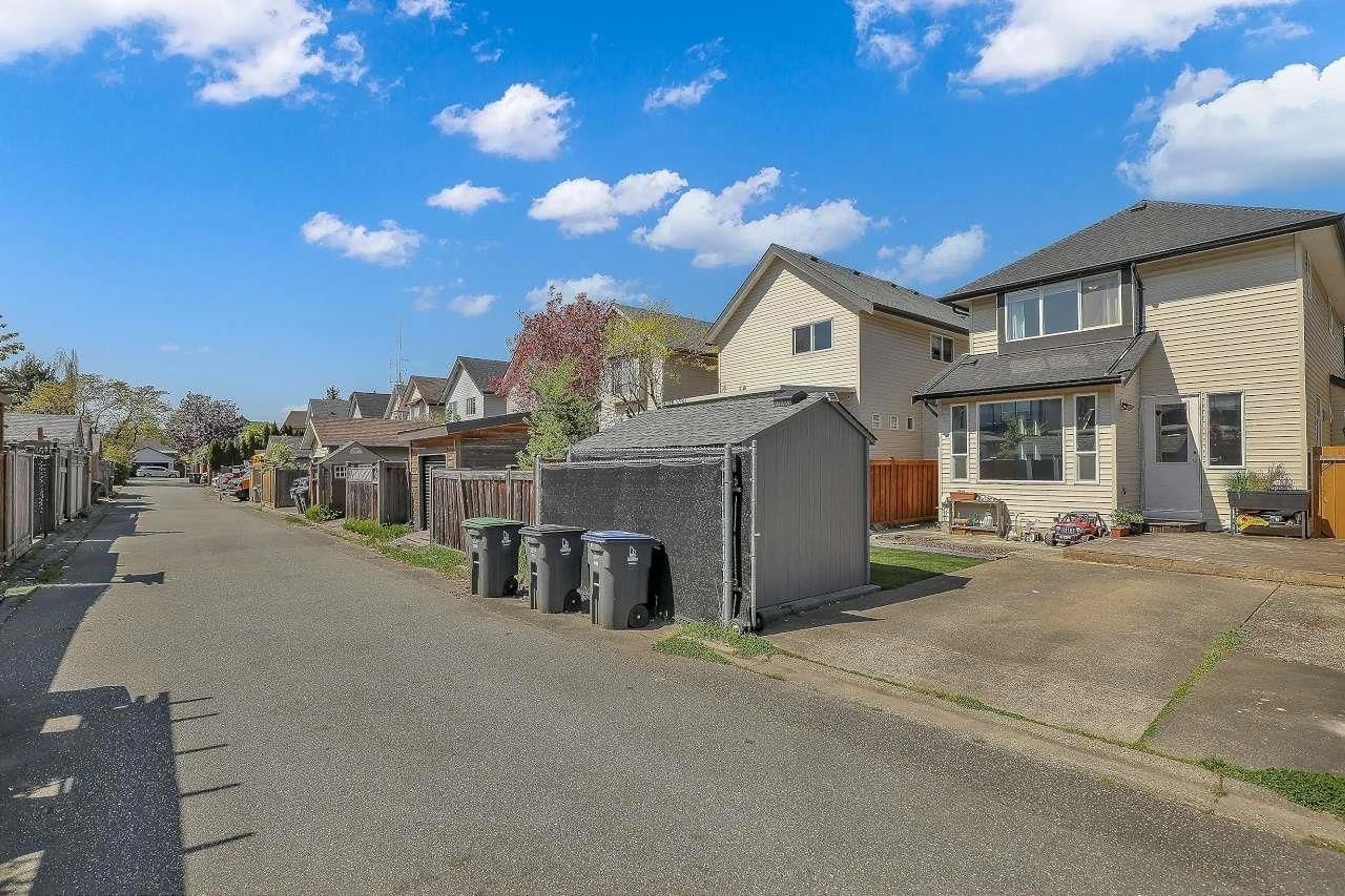 A pic from outside/outdoor area/front of a property/back of a property/a pic from drone, street for 18476 66A, Surrey British Columbia V3S9B1
