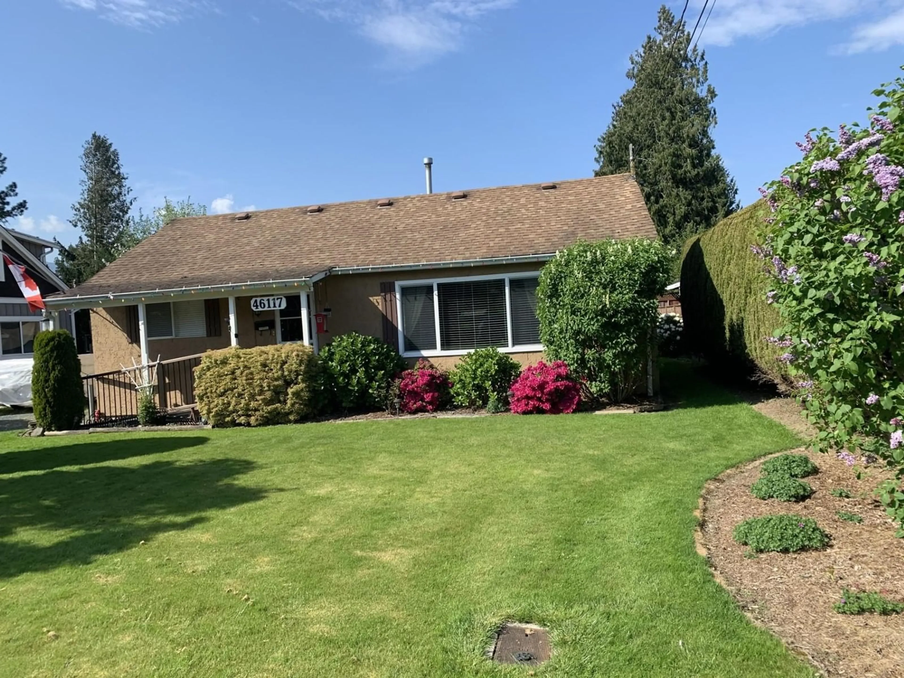 A pic from outside/outdoor area/front of a property/back of a property/a pic from drone, street for 46117 LEWIS AVENUE, Chilliwack British Columbia V2P3E2