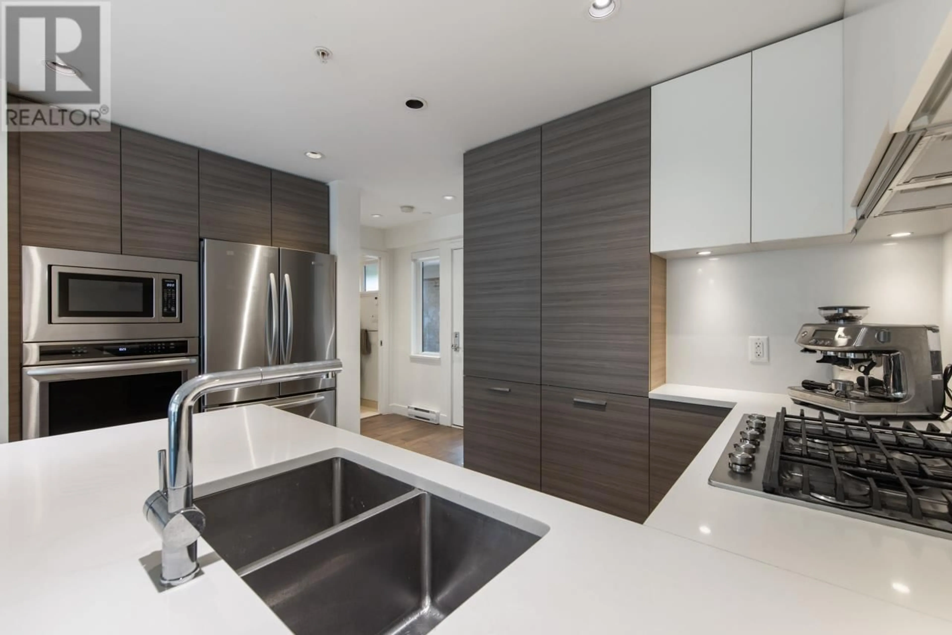 Contemporary kitchen, unknown for 205 - 3456 COMMERCIAL STREET, Vancouver British Columbia V5N4E9