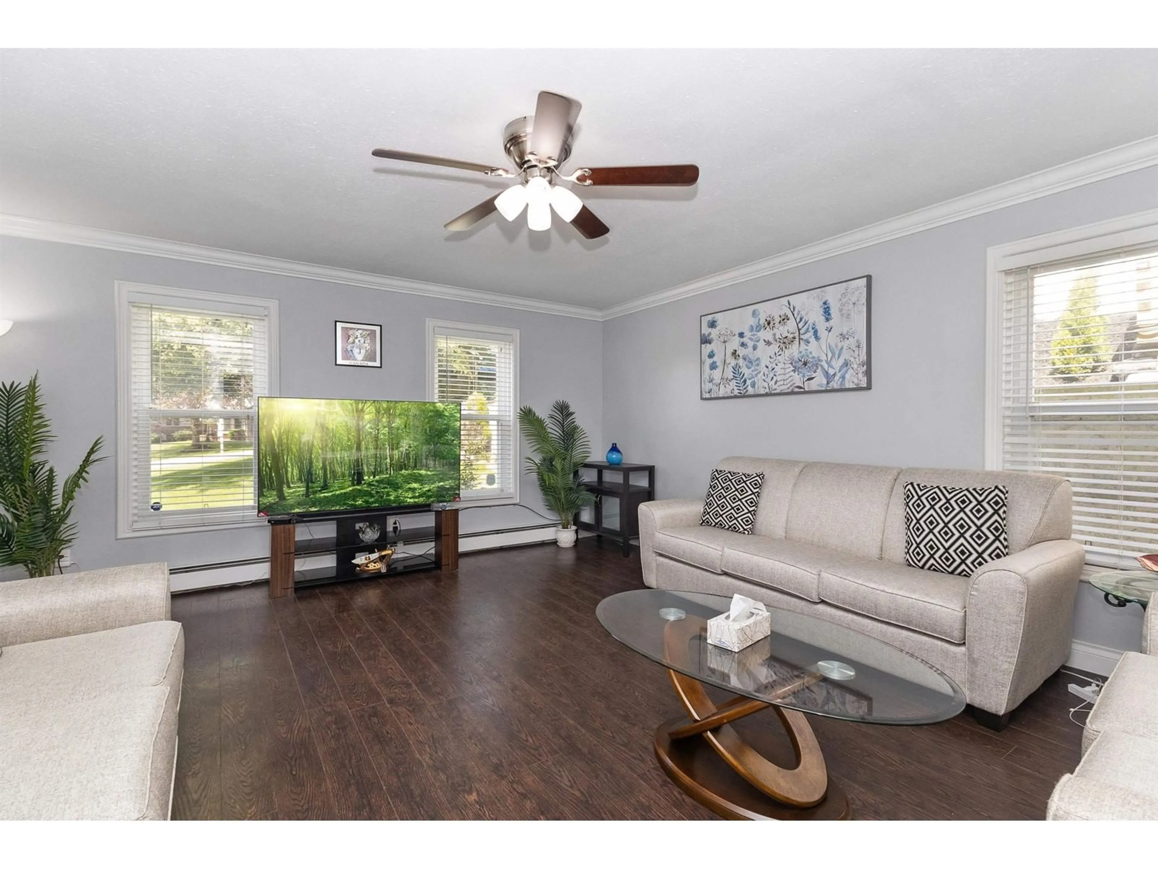 Living room with furniture, wood/laminate floor for 1898 VIEW GROVE, Abbotsford British Columbia V3G2E4
