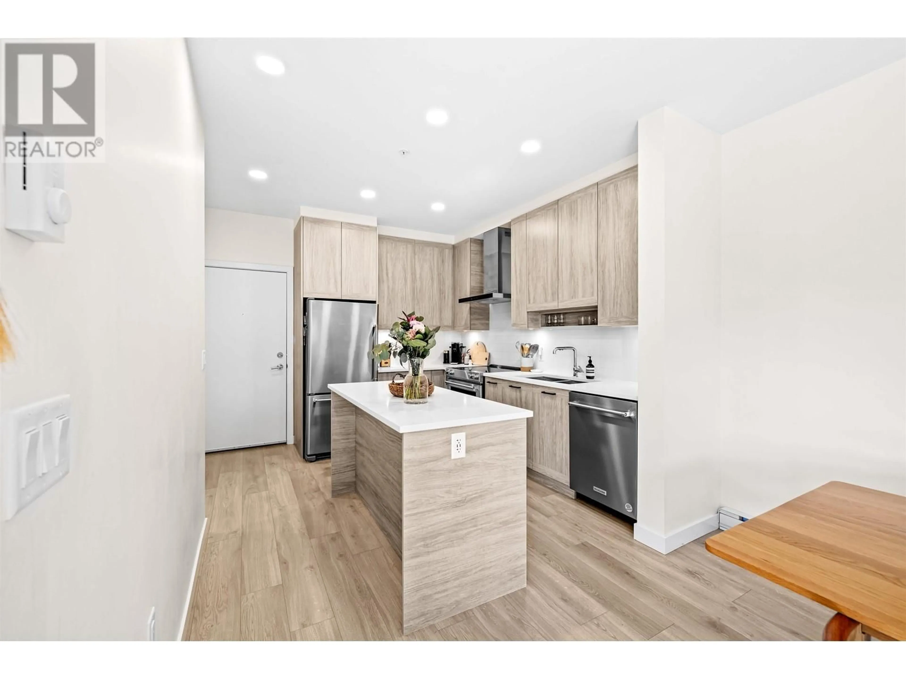 Open concept kitchen, wood/laminate floor for 501 - 7579 16TH STREET, Burnaby British Columbia V3N0H7
