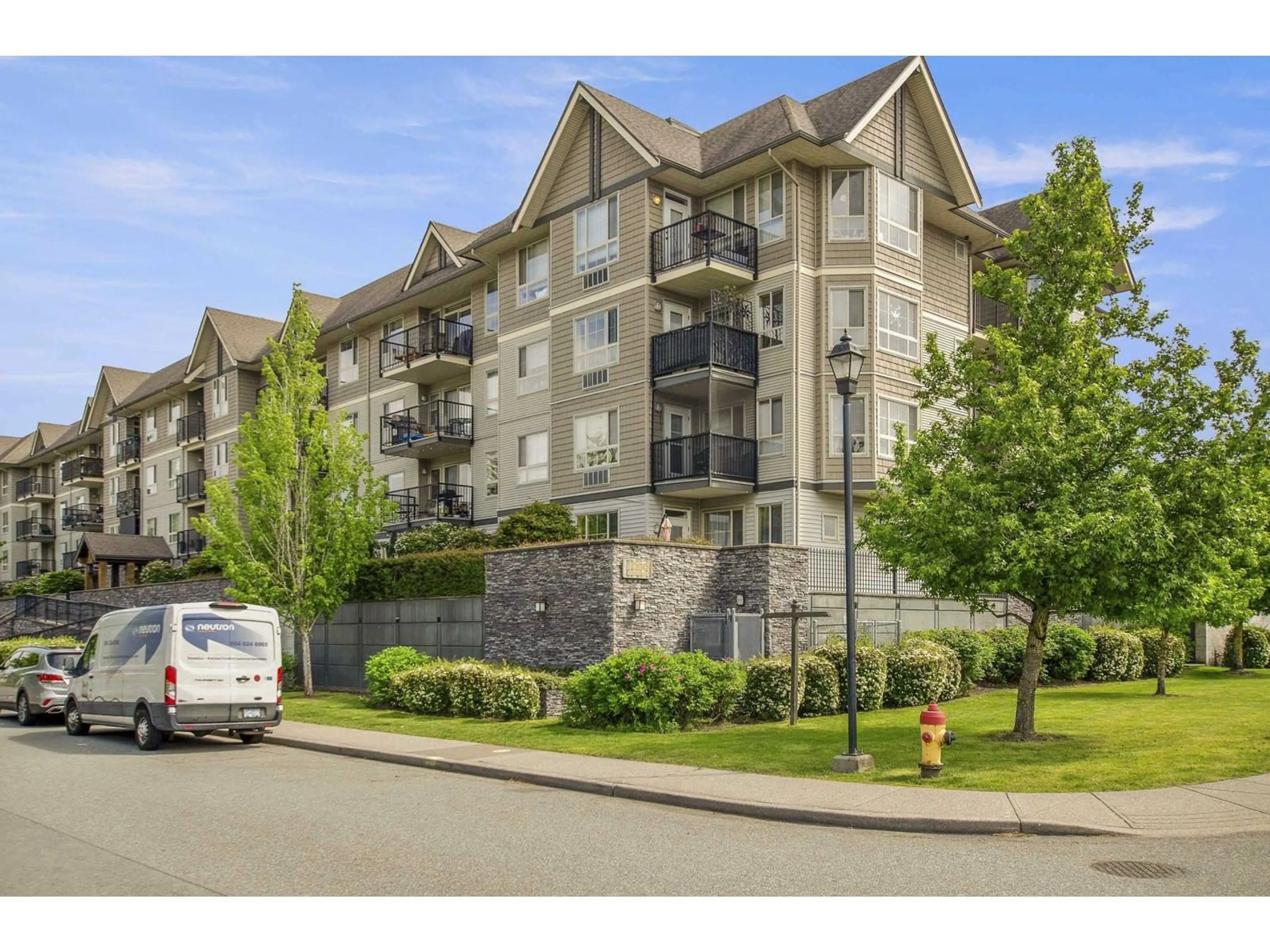 A pic from outside/outdoor area/front of a property/back of a property/a pic from drone, mountain view for 102 - 9000 BIRCH STREET, Chilliwack British Columbia V2P8G2