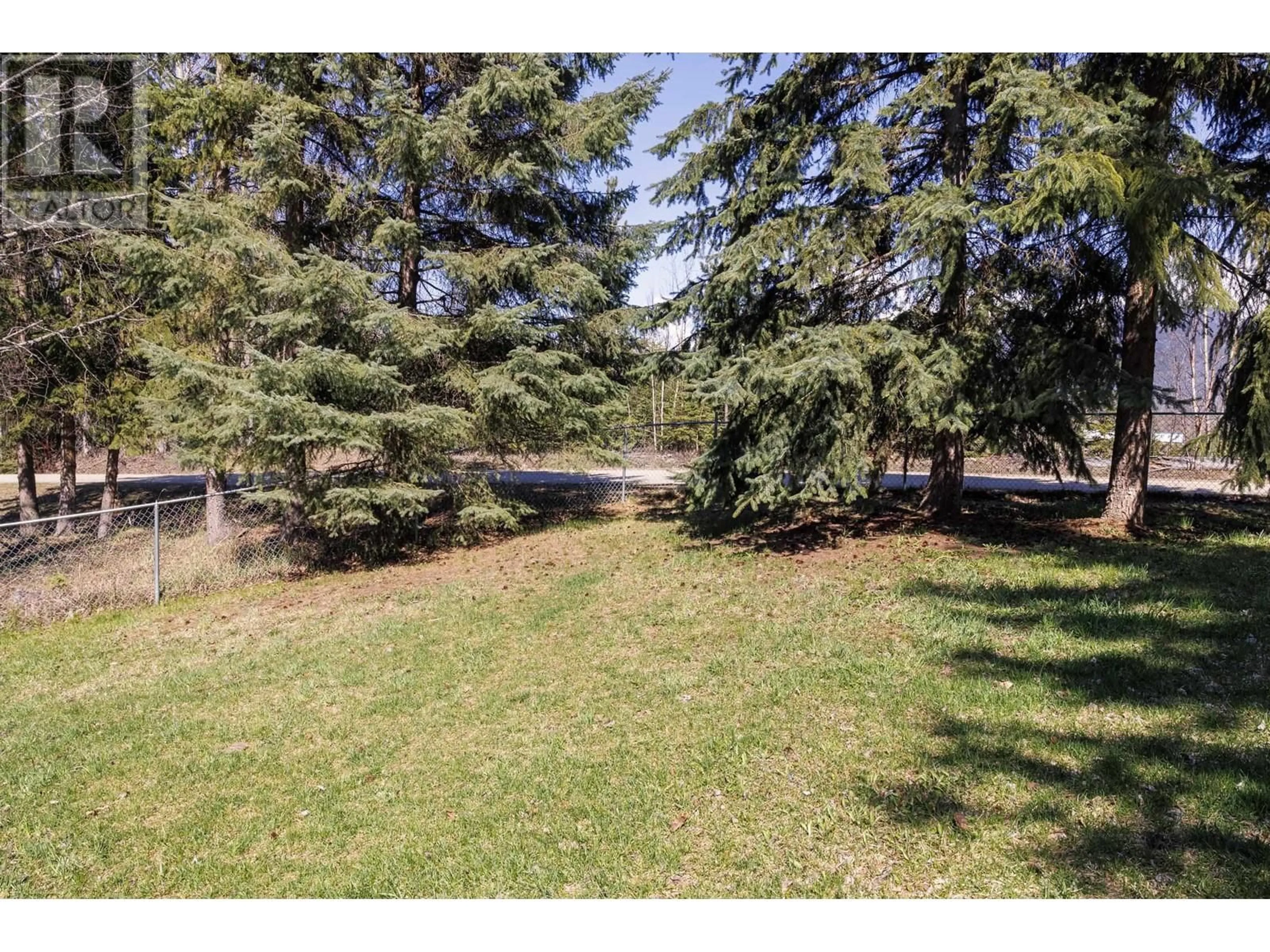 A pic from outside/outdoor area/front of a property/back of a property/a pic from drone, forest/trees view for 10 - 3115 RIVERBEND ROAD, McBride British Columbia V0J2E0