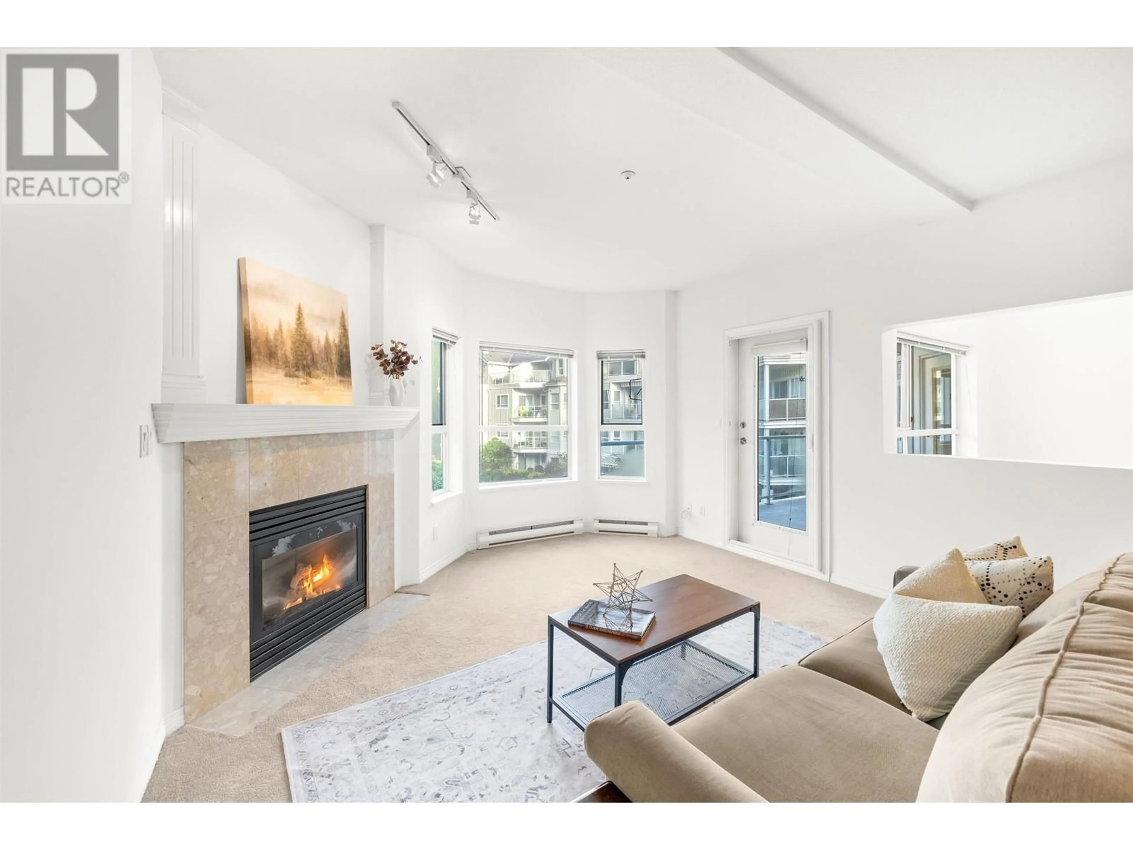 Living room with furniture, unknown for 307 - 1281 PARKGATE AVENUE, North Vancouver British Columbia V7H3A3