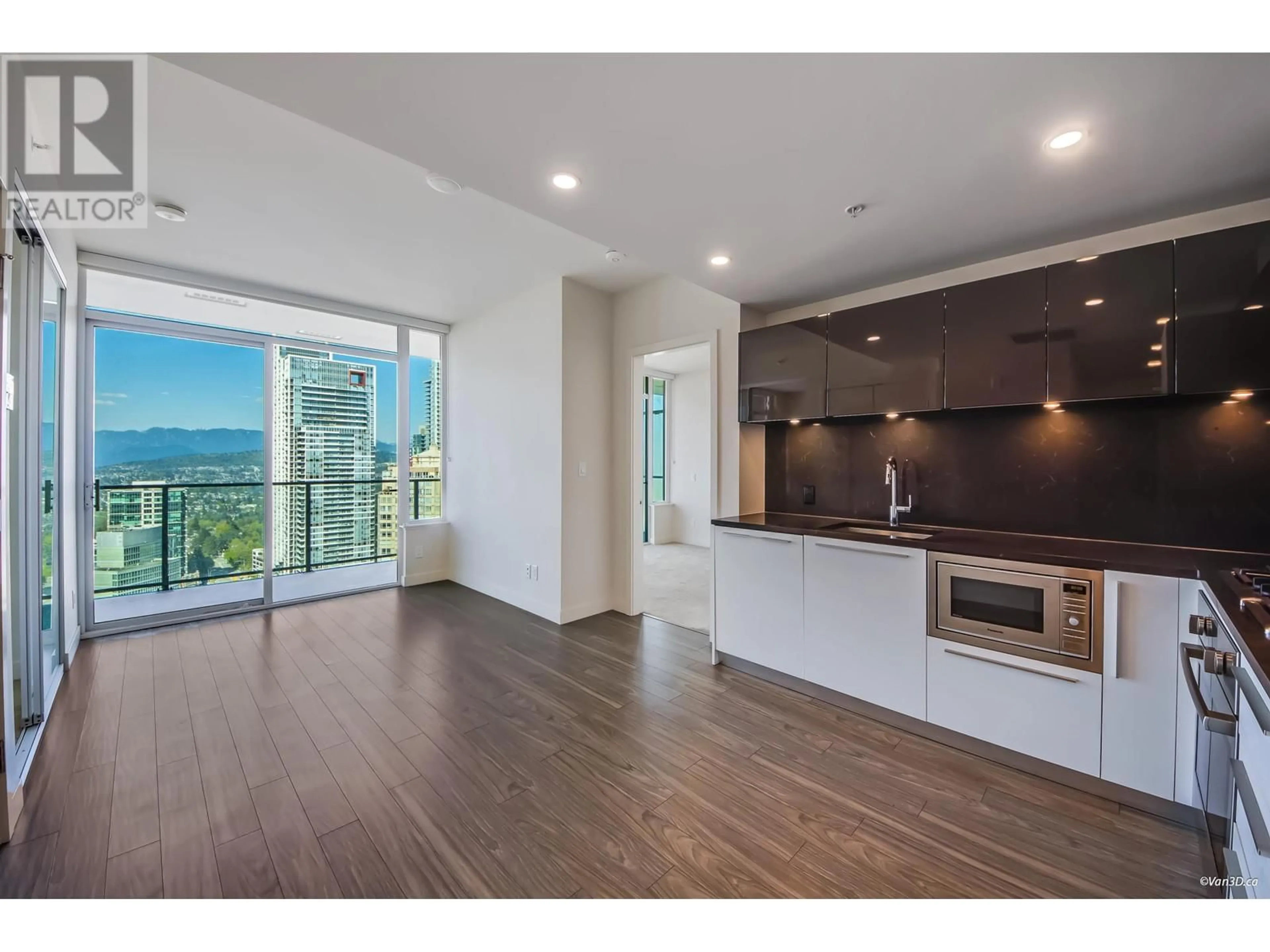 Open concept kitchen, wood/laminate floor for 2708 - 6383 MCKAY AVENUE, Burnaby British Columbia V5H0H8