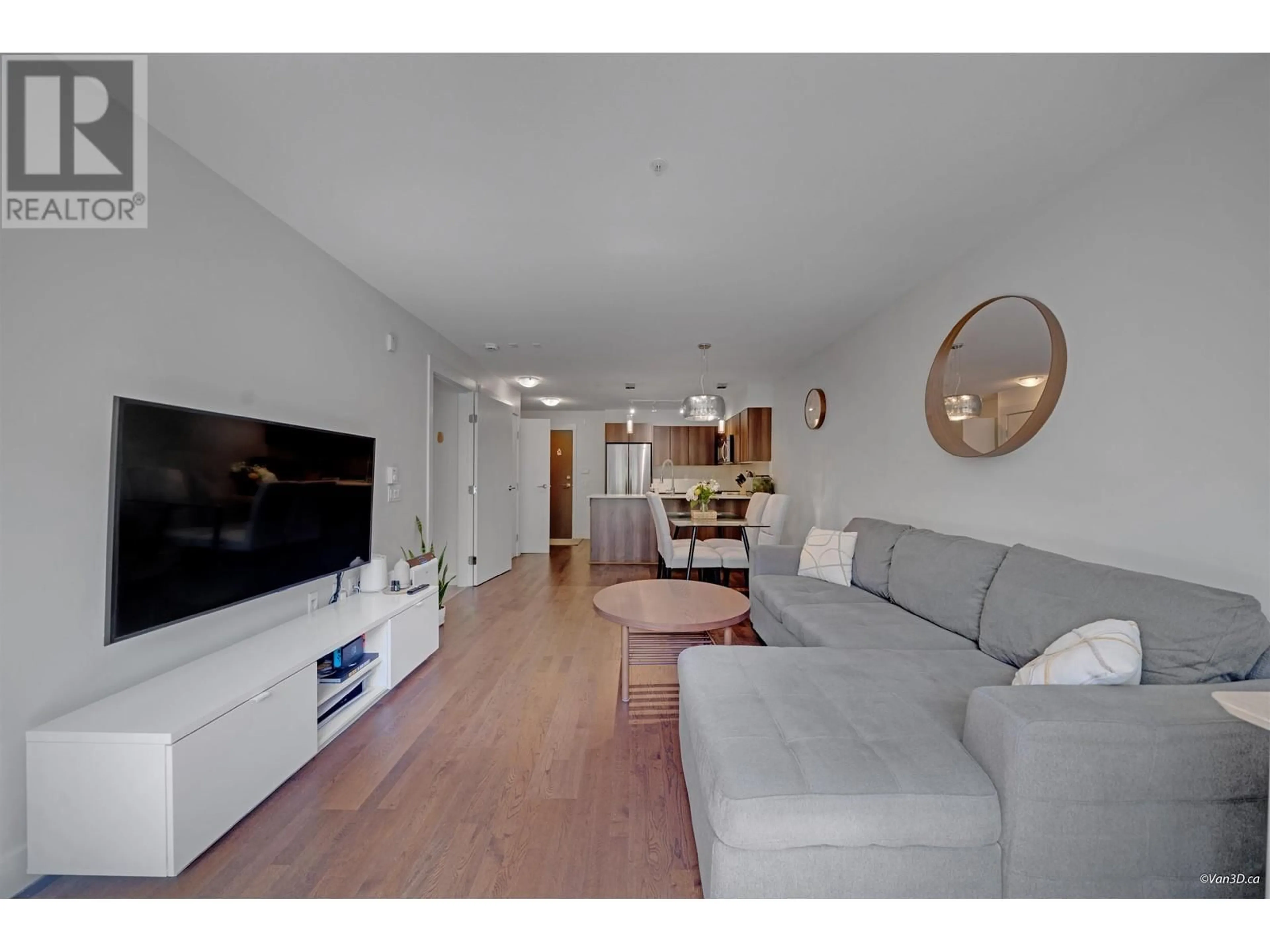 Living room with furniture, unknown for 103 - 7088 14TH AVENUE, Burnaby British Columbia V3N0E7