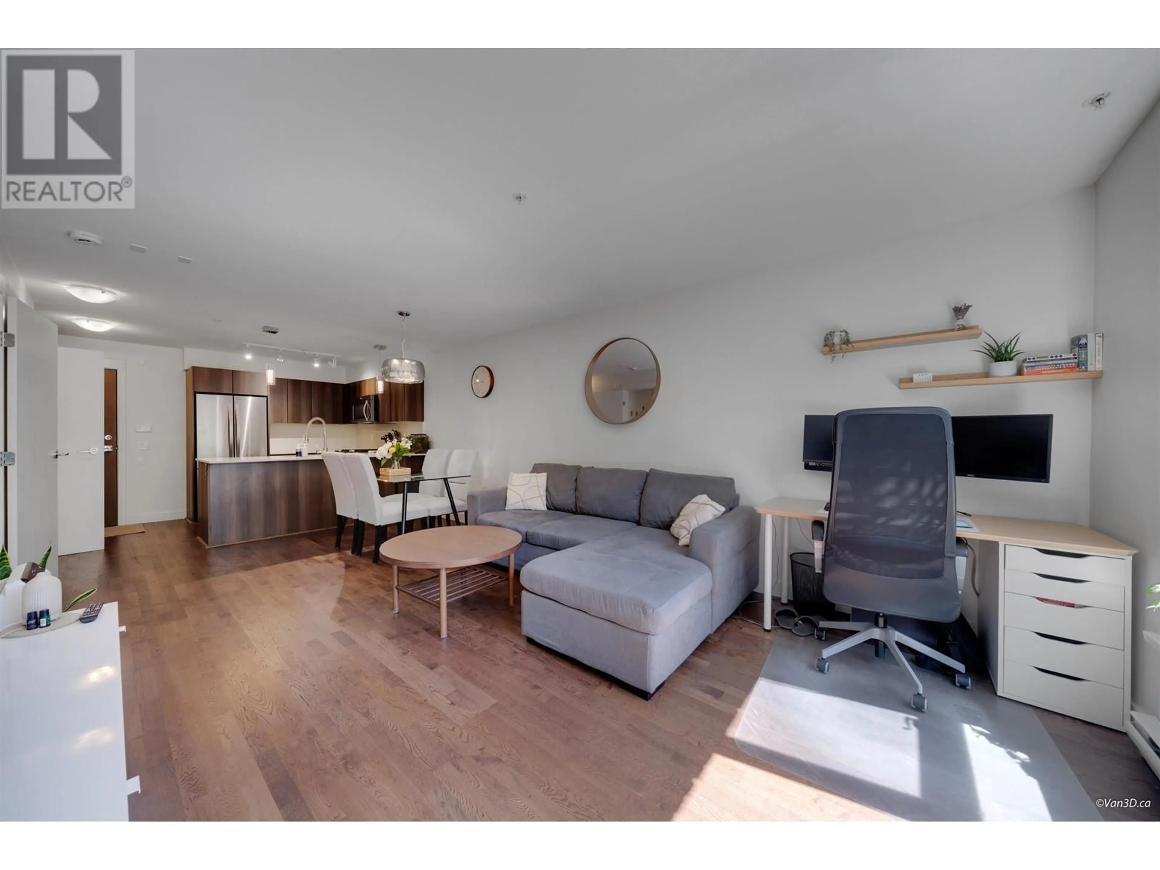 Living room with furniture, wood/laminate floor for 103 - 7088 14TH AVENUE, Burnaby British Columbia V3N0E7