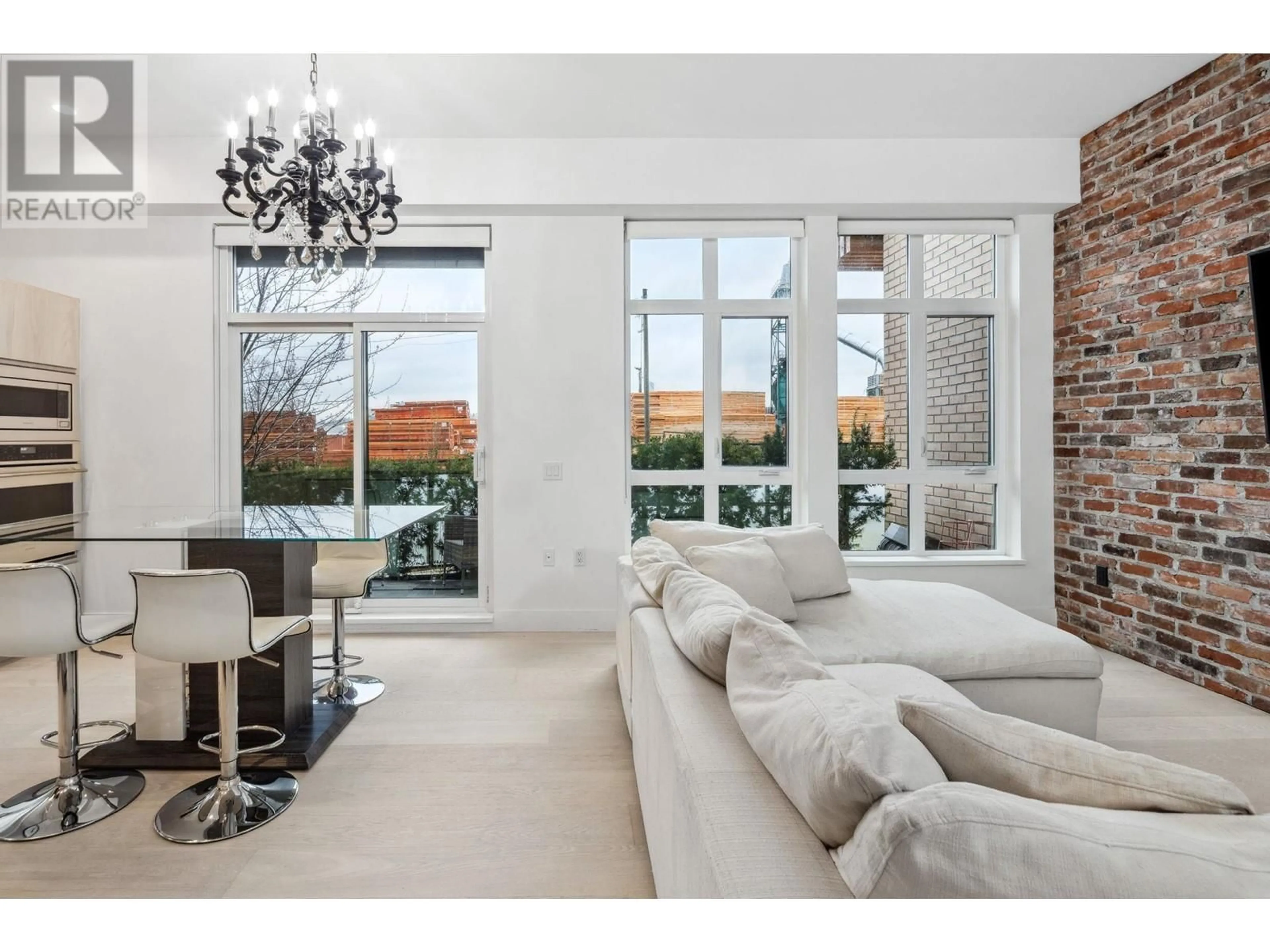 Living room with furniture, ceramic/tile floor for 121 - 300 SALTER STREET, New Westminster British Columbia V3M0L9