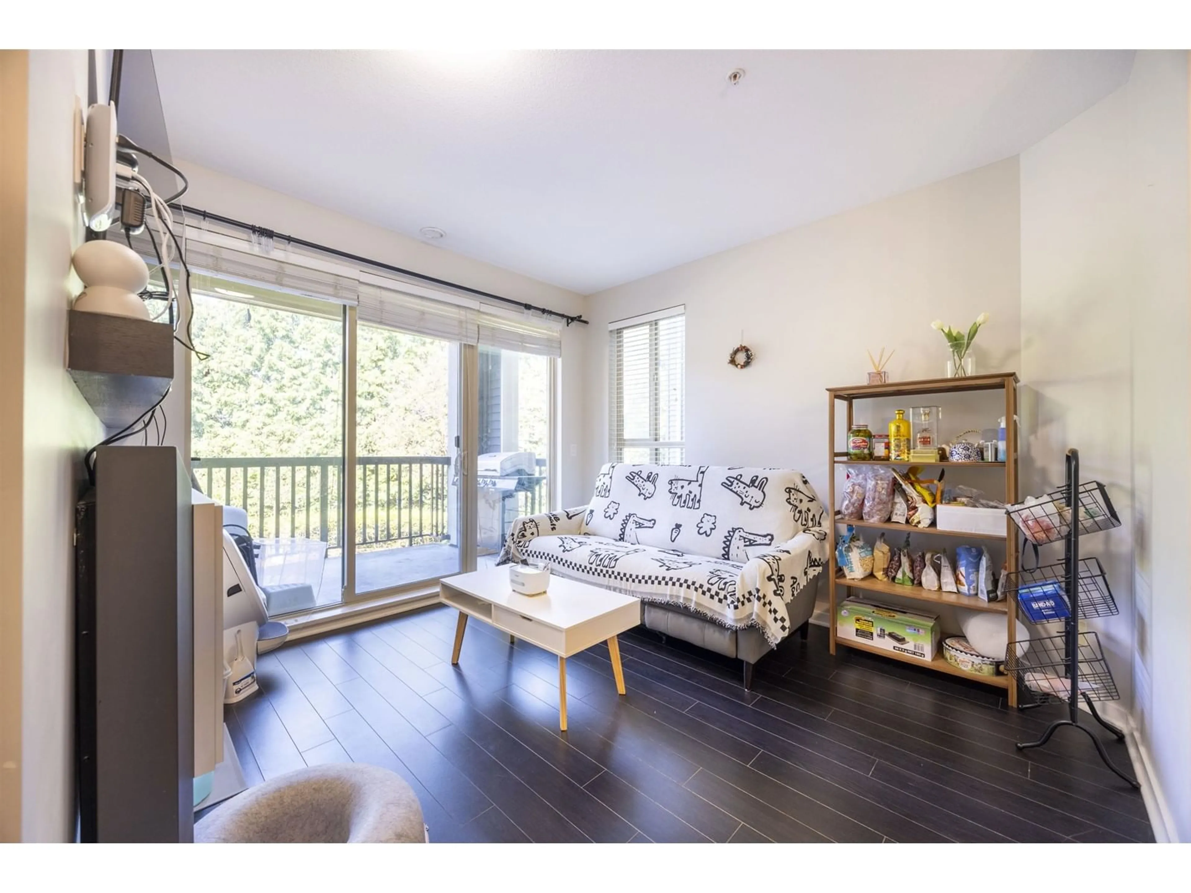 Living room with furniture, wood/laminate floor for 222 - 5655 210A, Langley British Columbia V3A0G4