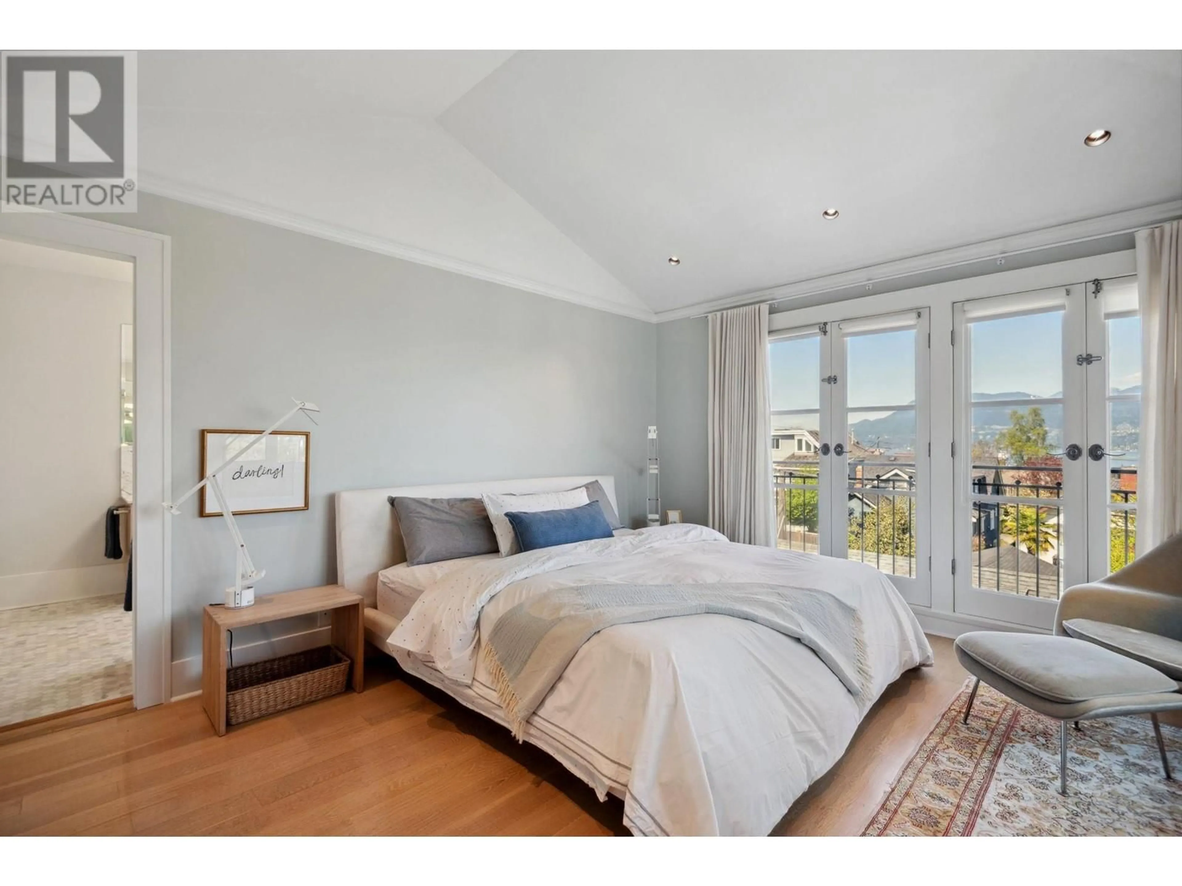 Bedroom with bed, wood/laminate floor for 3881 14TH AVENUE, Vancouver British Columbia V6R2X1