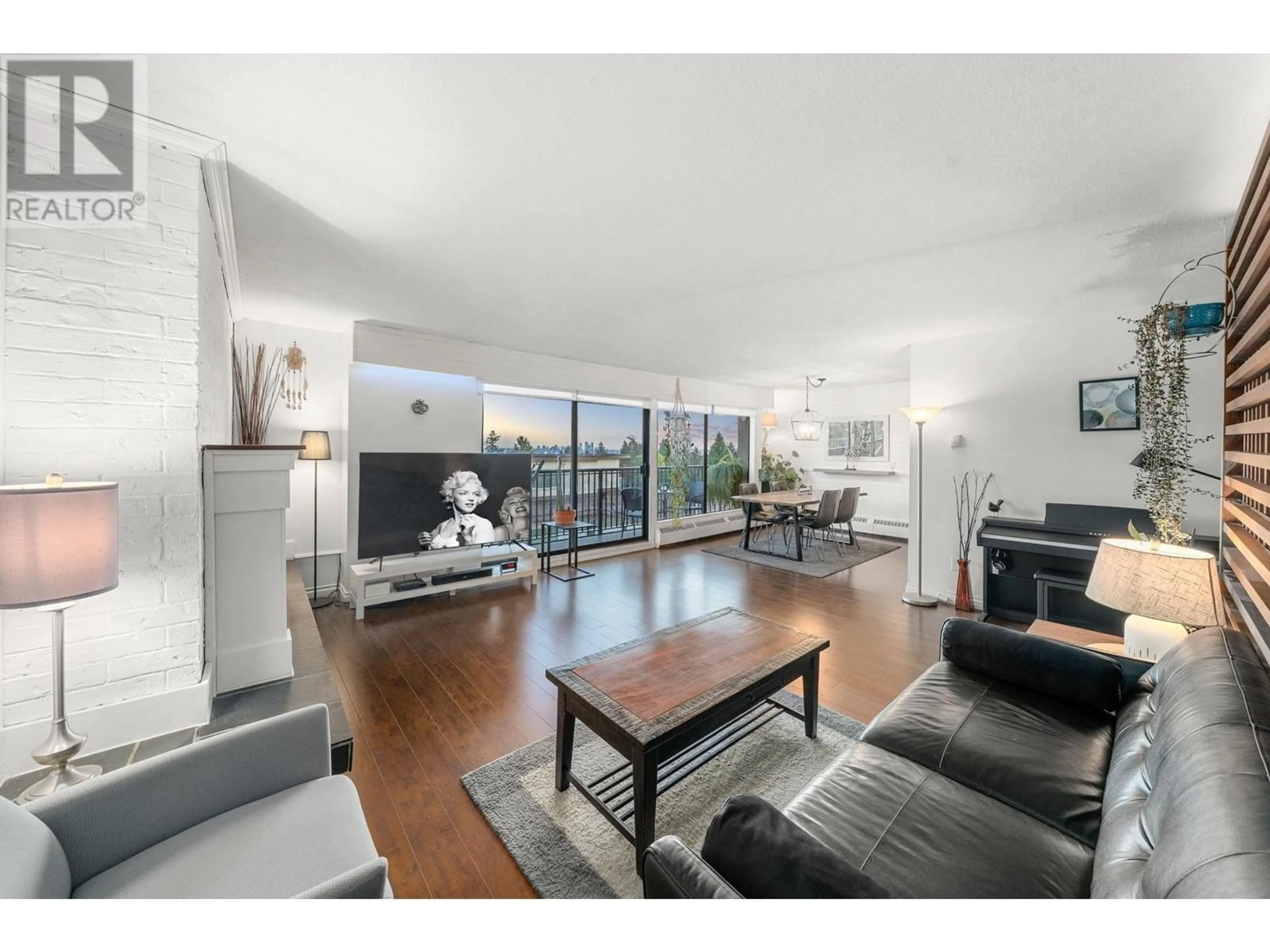 Living room with furniture, wood/laminate floor for 302 - 2545 LONSDALE AVENUE, North Vancouver British Columbia V7N3H7