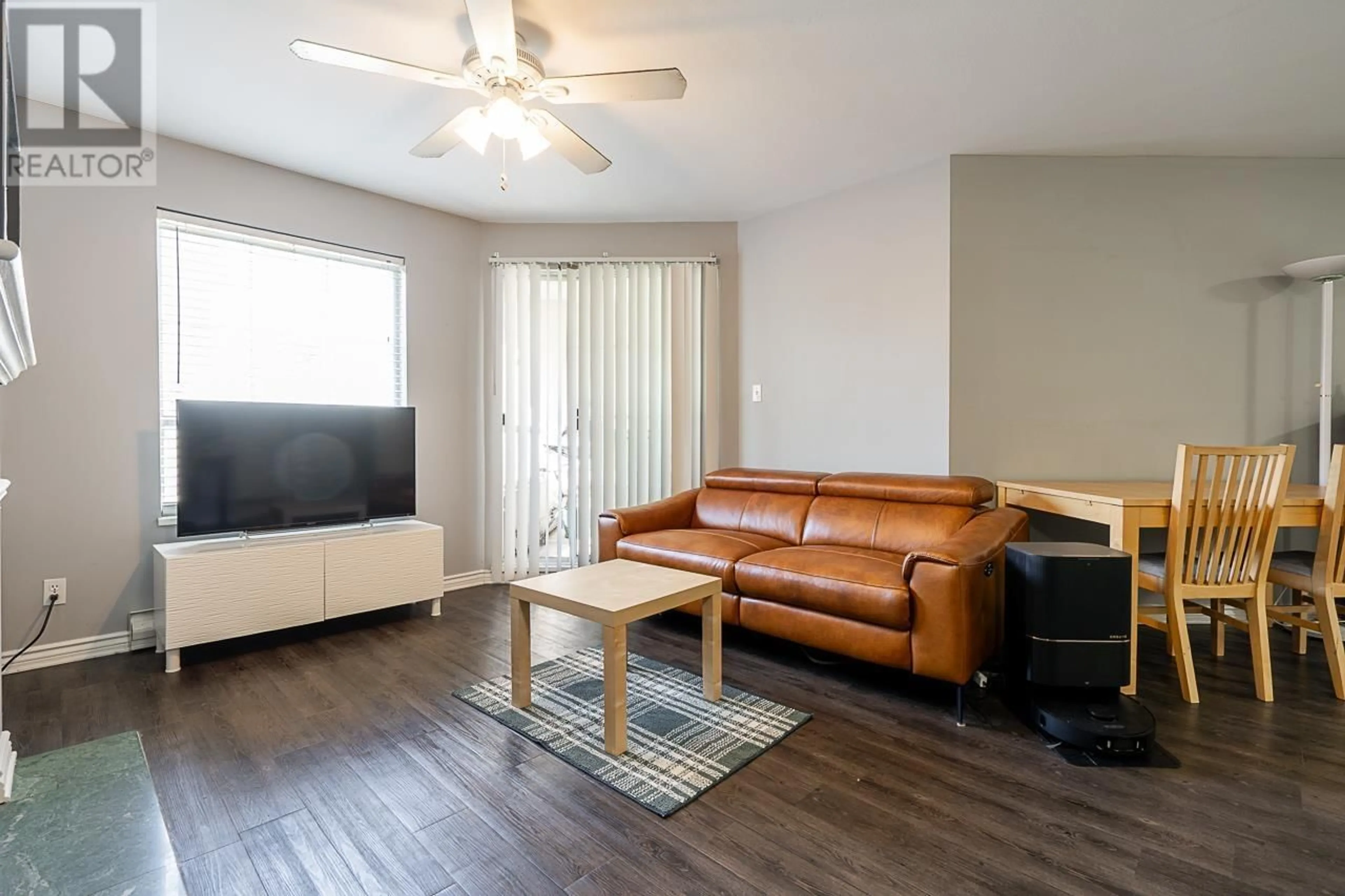 Living room with furniture, wood/laminate floor for 201 - 295 SCHOOLHOUSE STREET, Coquitlam British Columbia V3K6X5