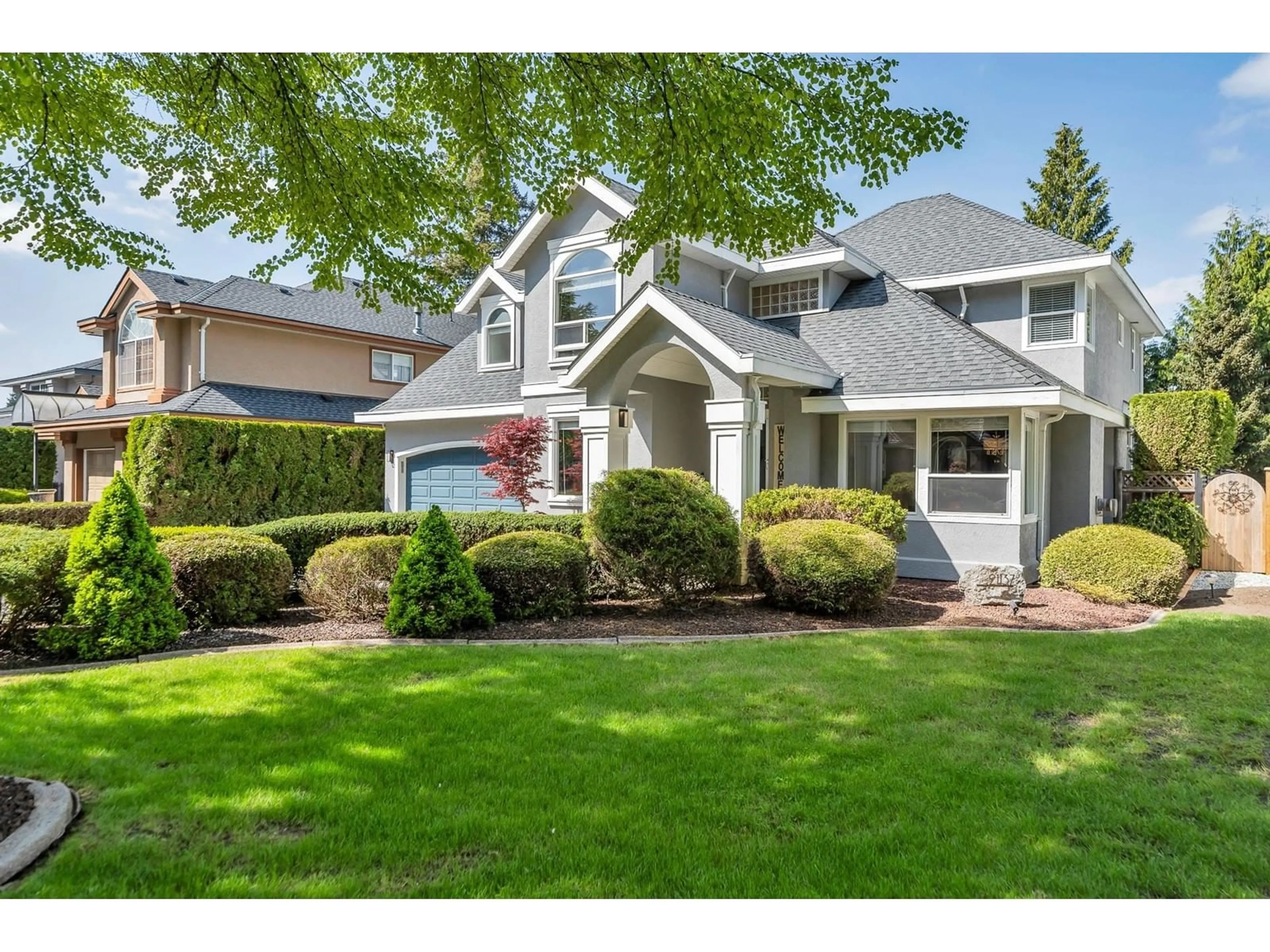 Home with vinyl exterior material, street for 21137 43A, Langley British Columbia V3A8L8