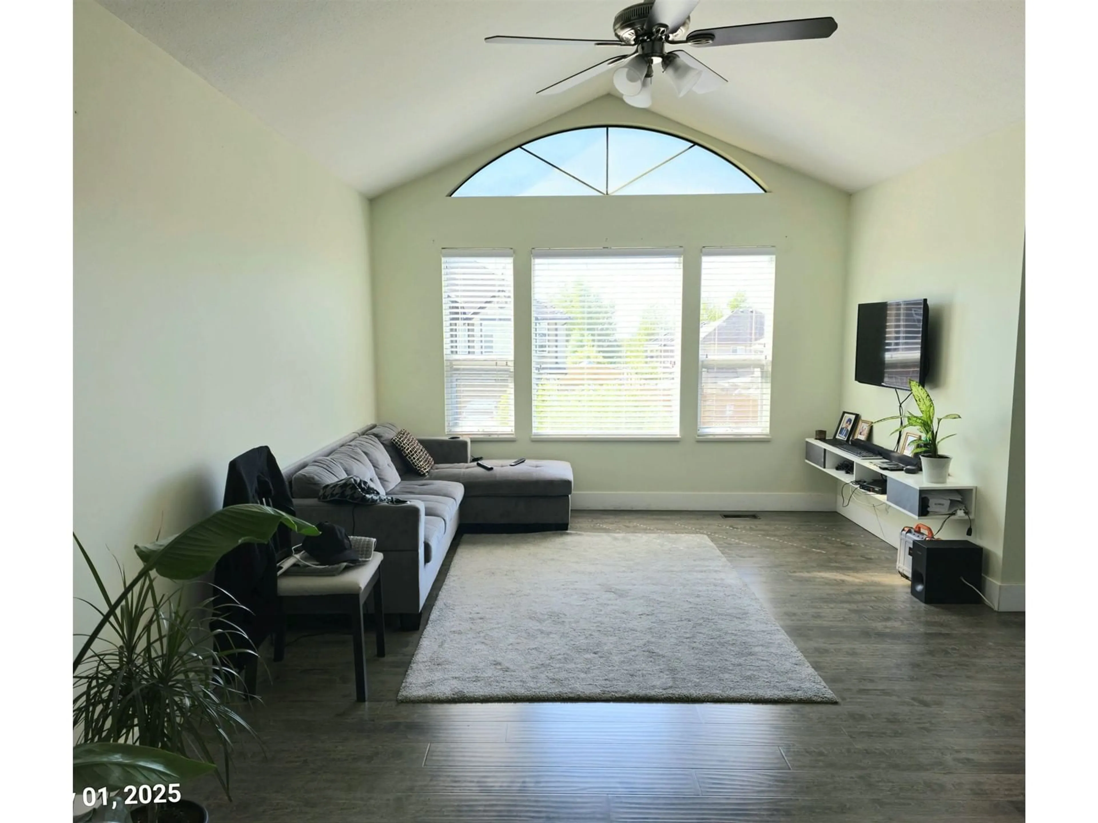 Living room with furniture, wood/laminate floor for 31005 UPPER MACLURE, Abbotsford British Columbia V2T5J5