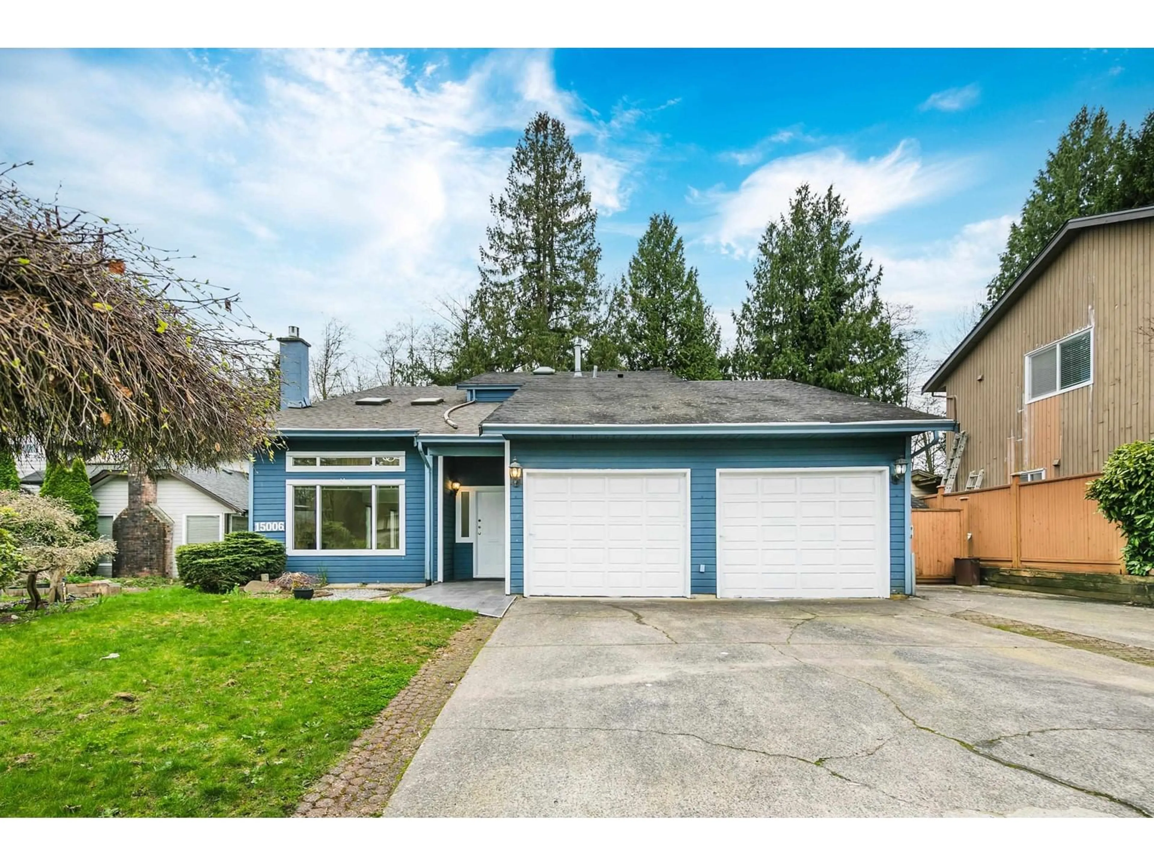 Home with vinyl exterior material, street for 15006 99A, Surrey British Columbia V3R7N1