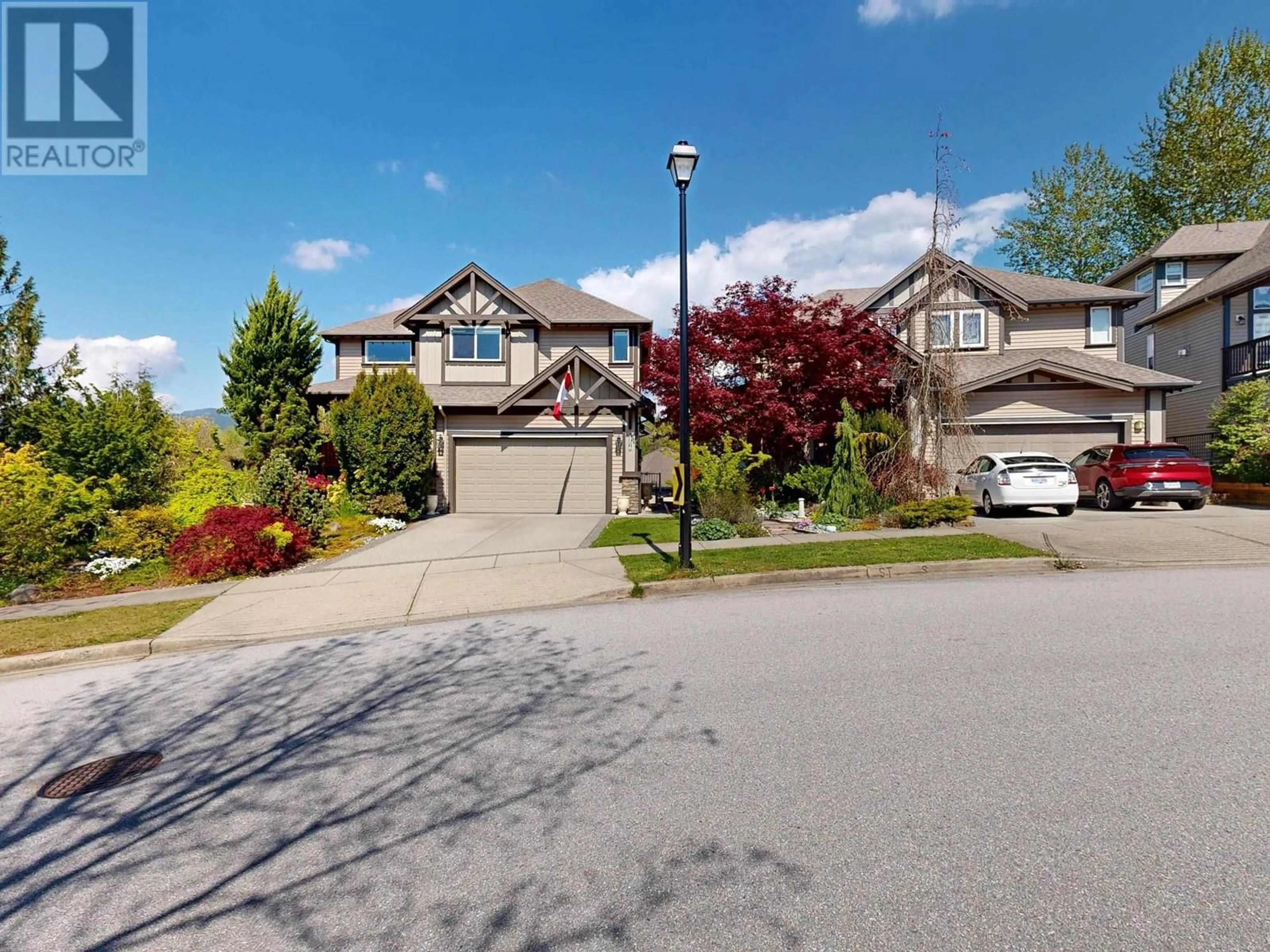 A pic from outside/outdoor area/front of a property/back of a property/a pic from drone, street for 22879 137 AVENUE, Maple Ridge British Columbia V4R0B6