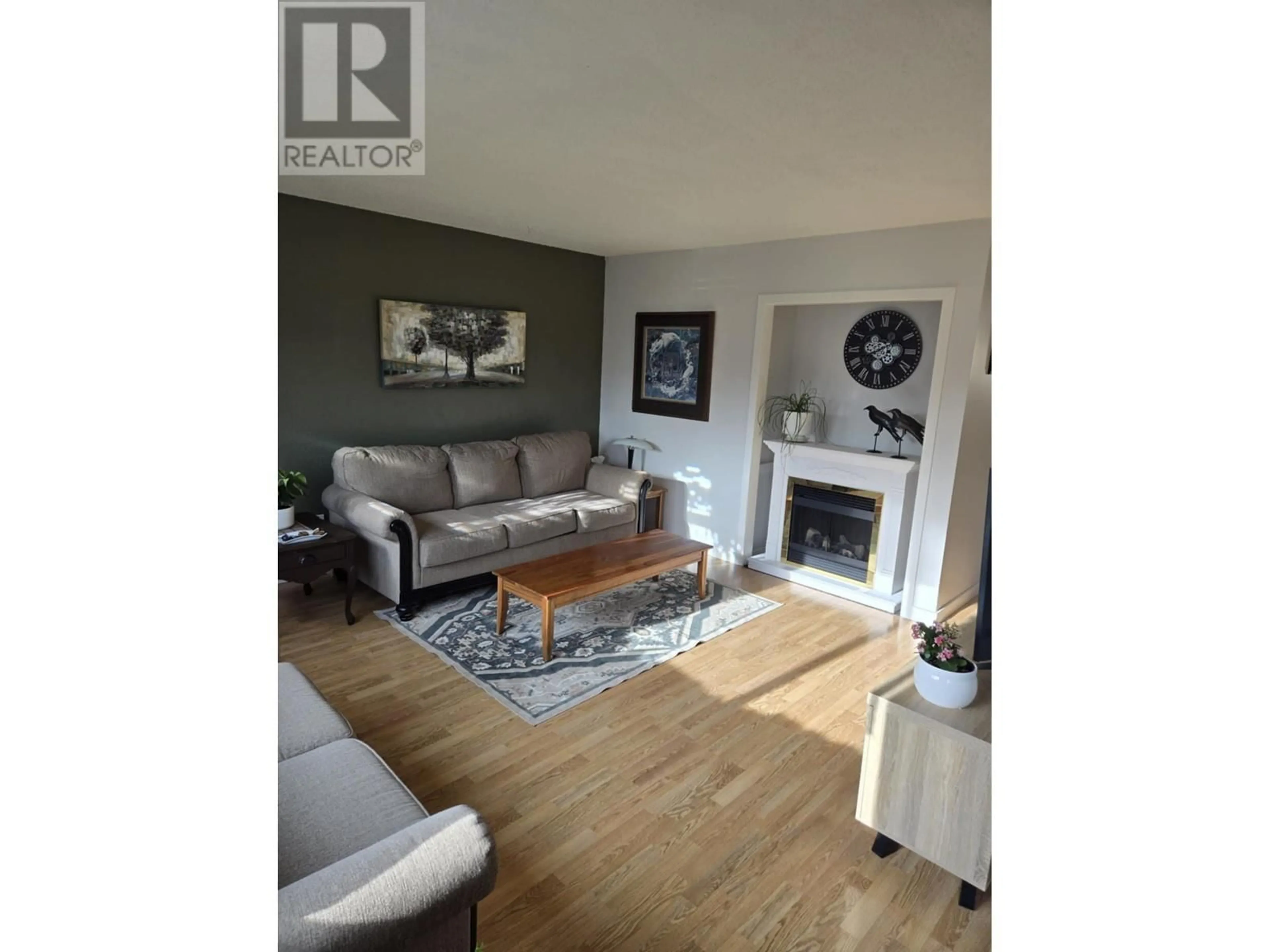 Living room with furniture, wood/laminate floor for 1413 DRUMMOND STREET, Prince George British Columbia V2M4J2