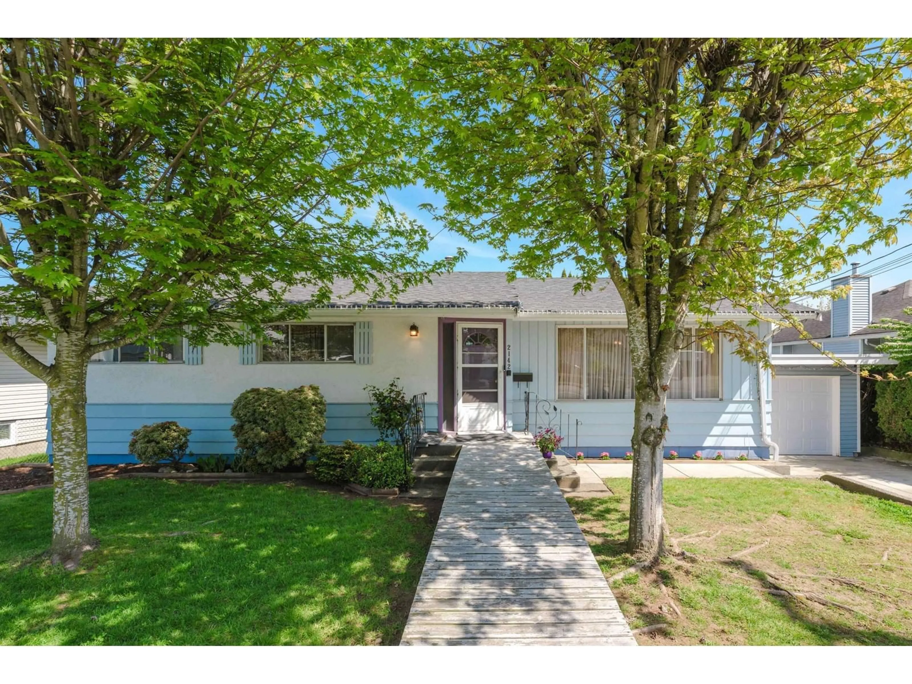Home with vinyl exterior material, street for 2142 WARE, Abbotsford British Columbia V2S3C2