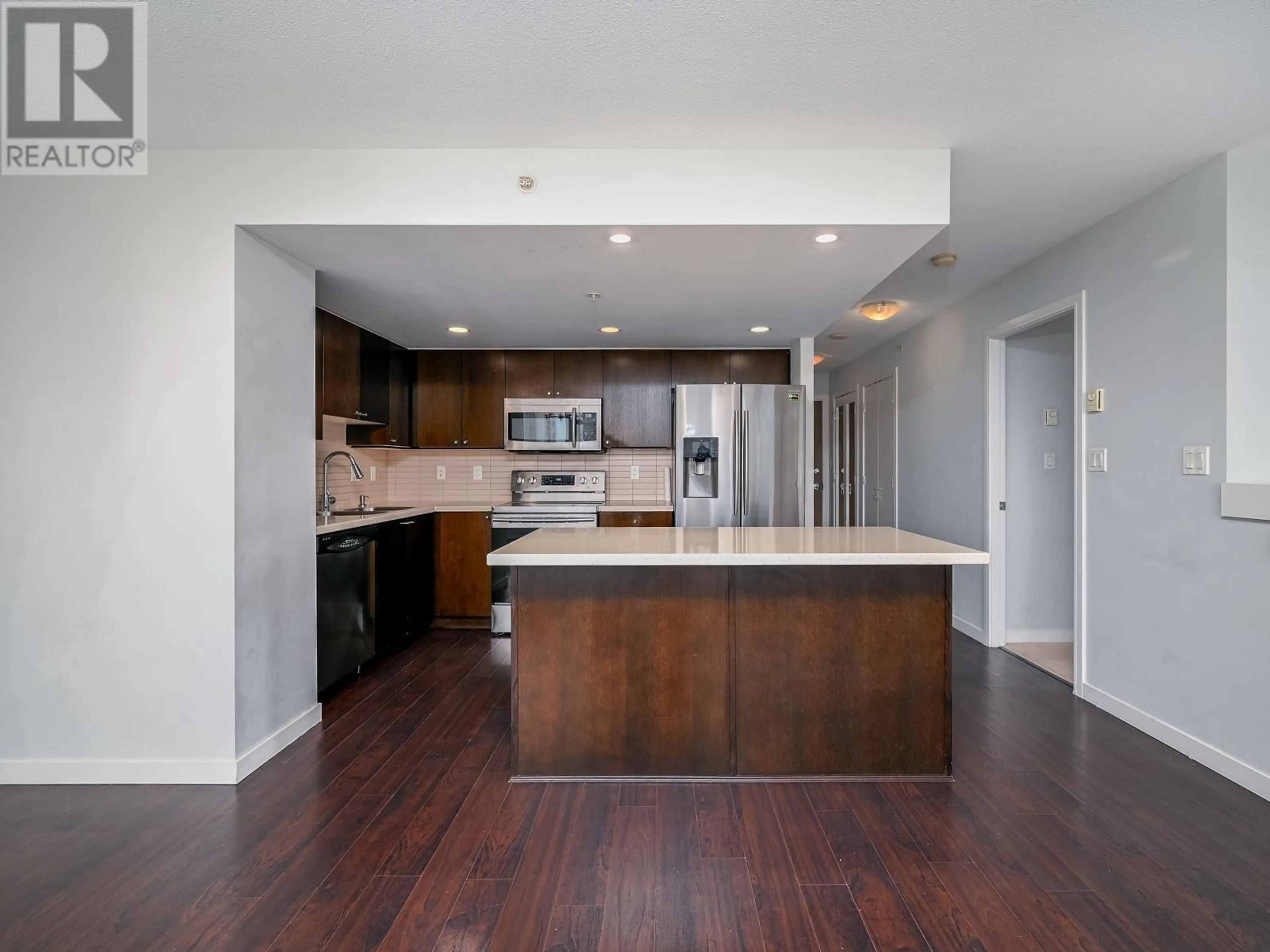 Open concept kitchen, wood/laminate floor for 906 - 4400 BUCHANAN STREET, Burnaby British Columbia V5C0E3