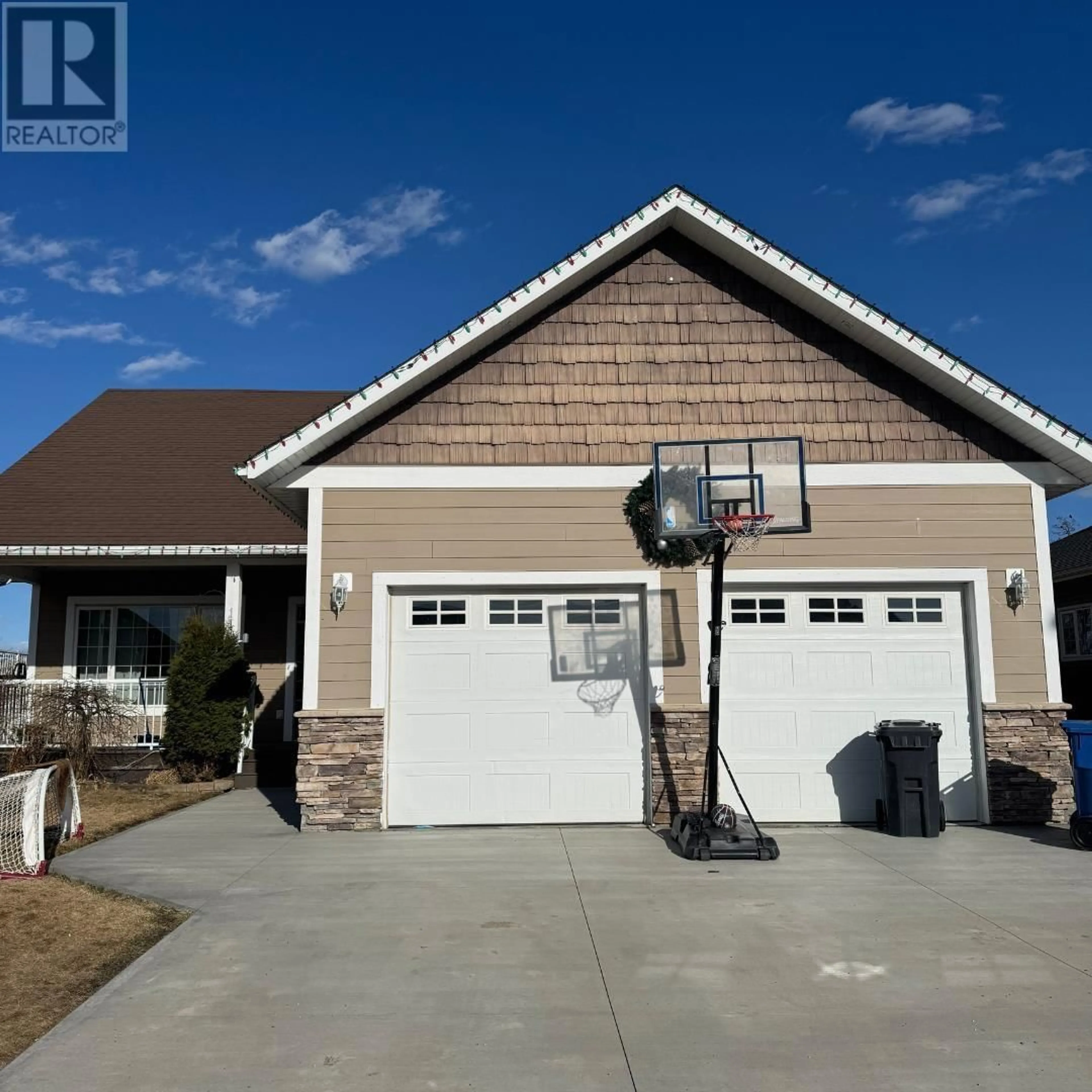 Home with vinyl exterior material, street for 11019 86A STREET, Fort St. John British Columbia V1J0A6