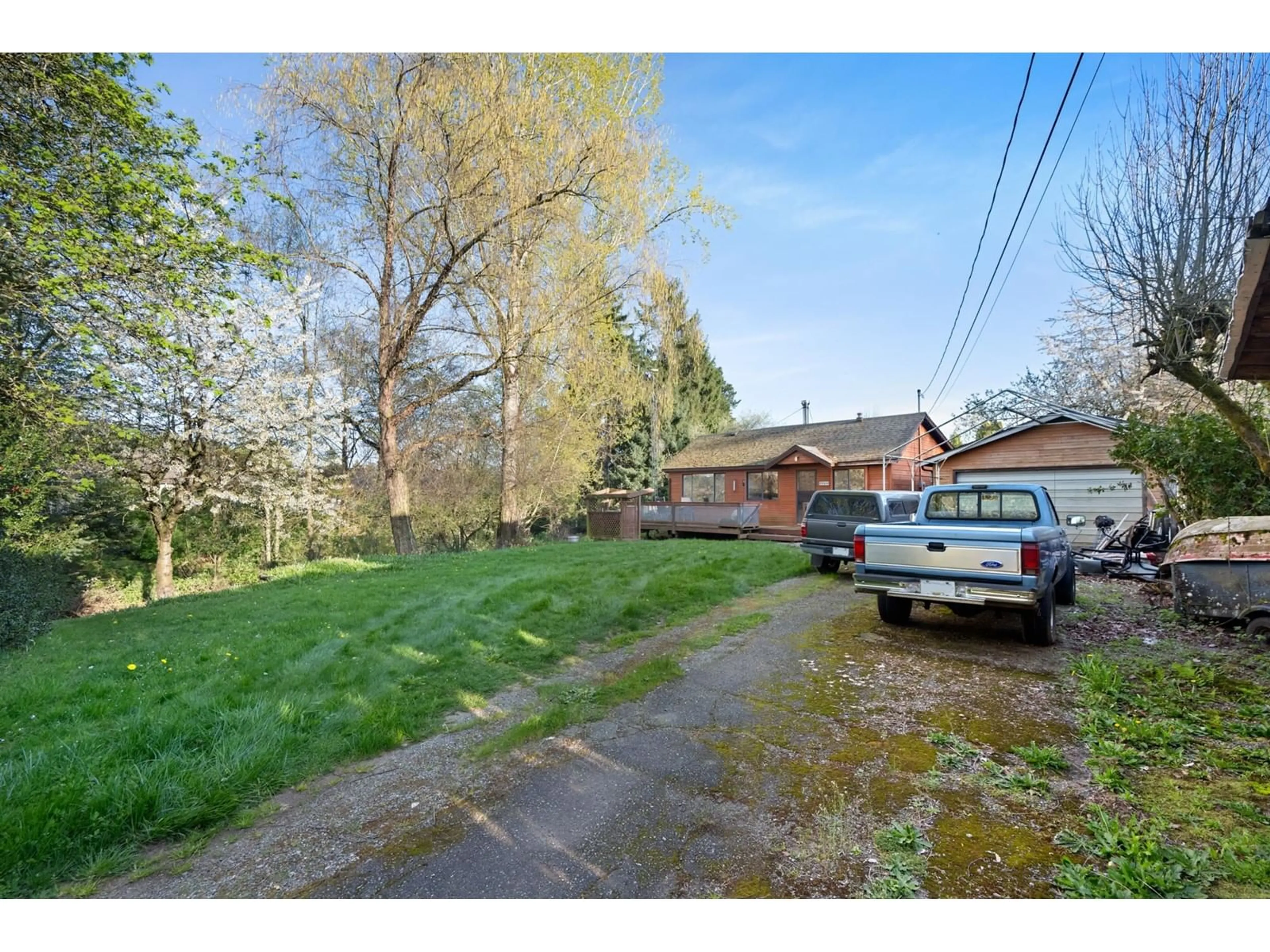A pic from outside/outdoor area/front of a property/back of a property/a pic from drone, street for 27394 30, Langley British Columbia V3A2V3