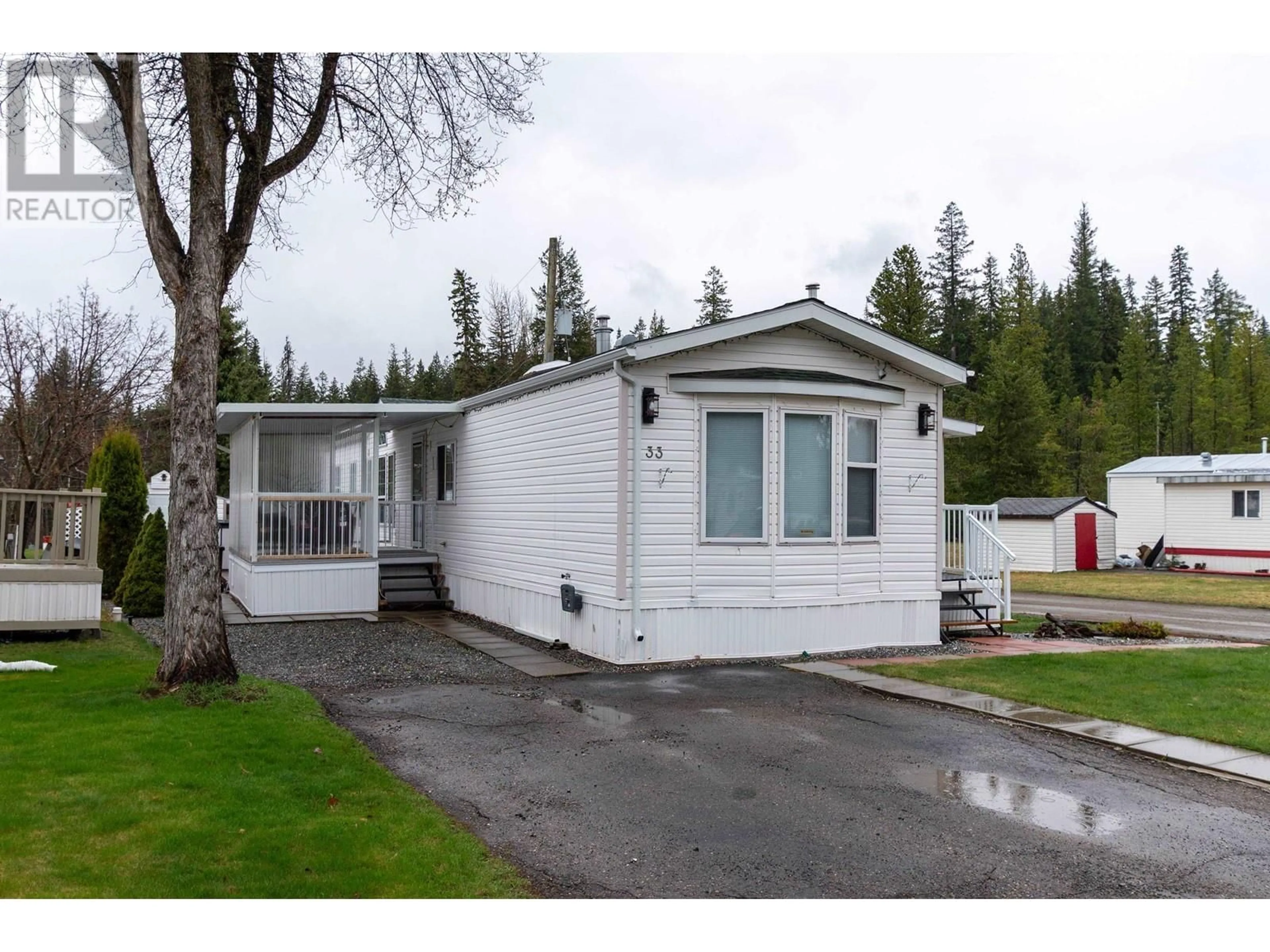 Home with vinyl exterior material, street for 33 - 1000 INVERNESS ROAD, Prince George British Columbia V2K4V1