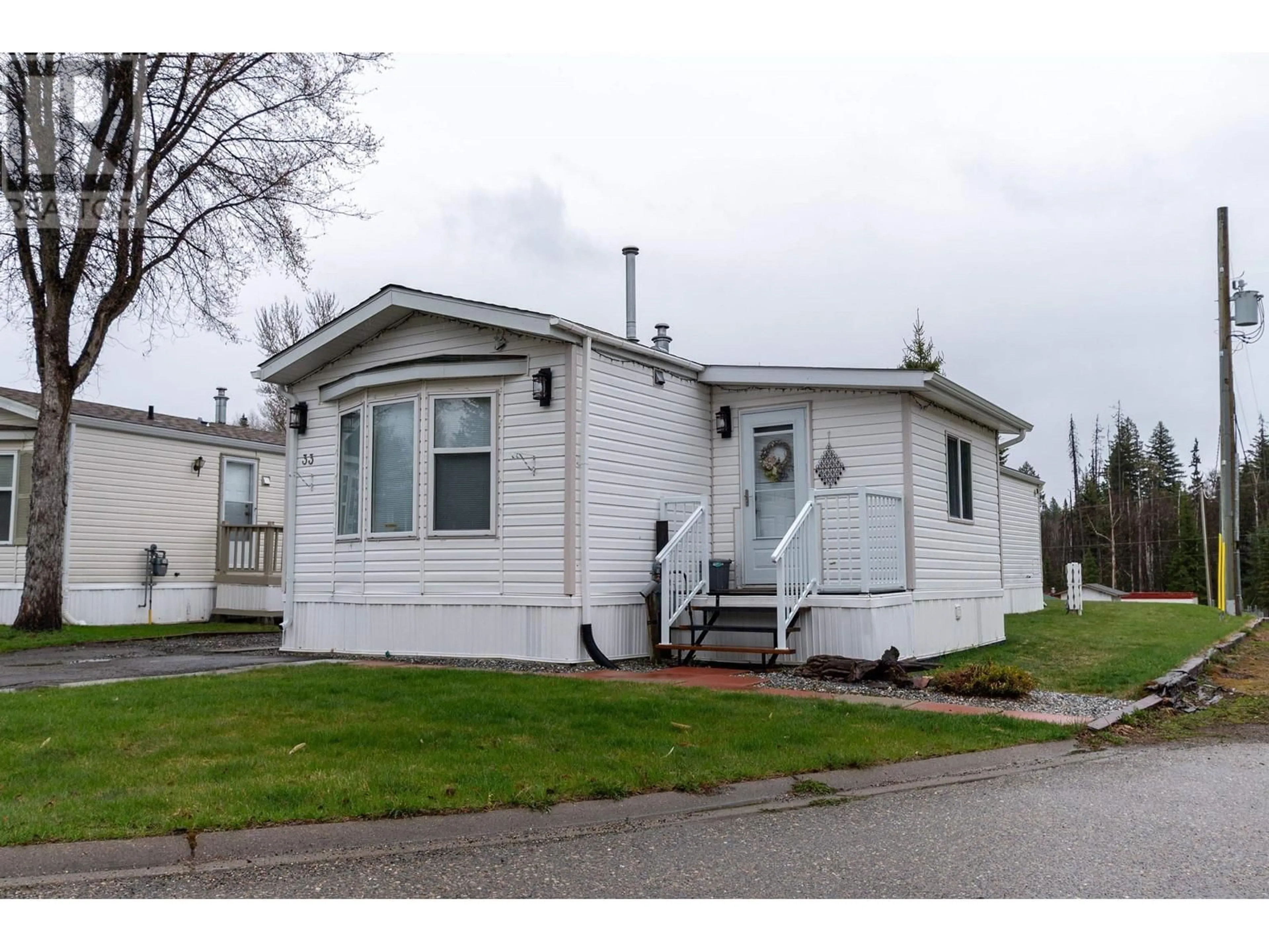 Home with vinyl exterior material, street for 33 - 1000 INVERNESS ROAD, Prince George British Columbia V2K4V1