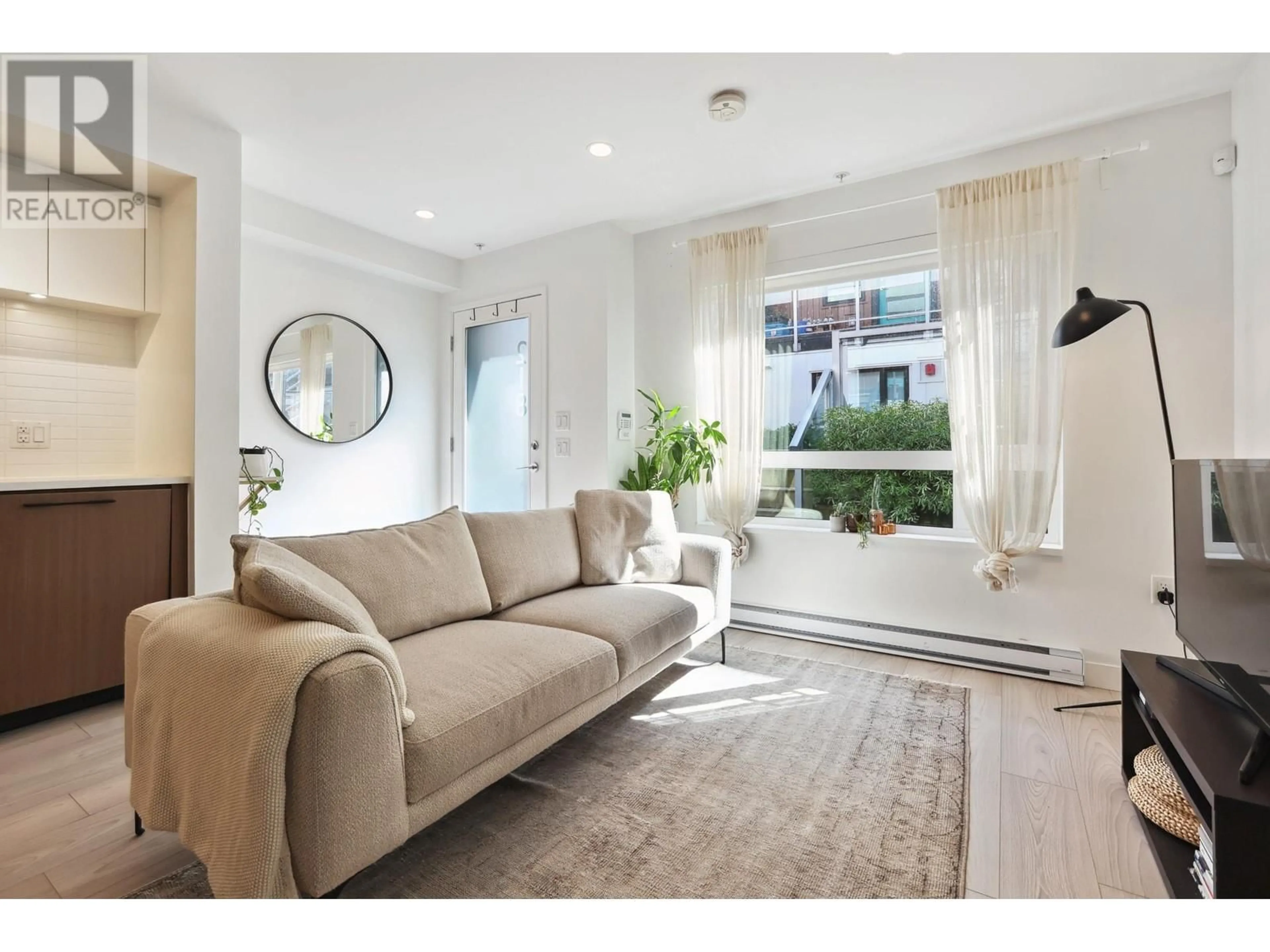 Living room with furniture, unknown for 218 - 311 16 AVENUE, Vancouver British Columbia V5T2T7