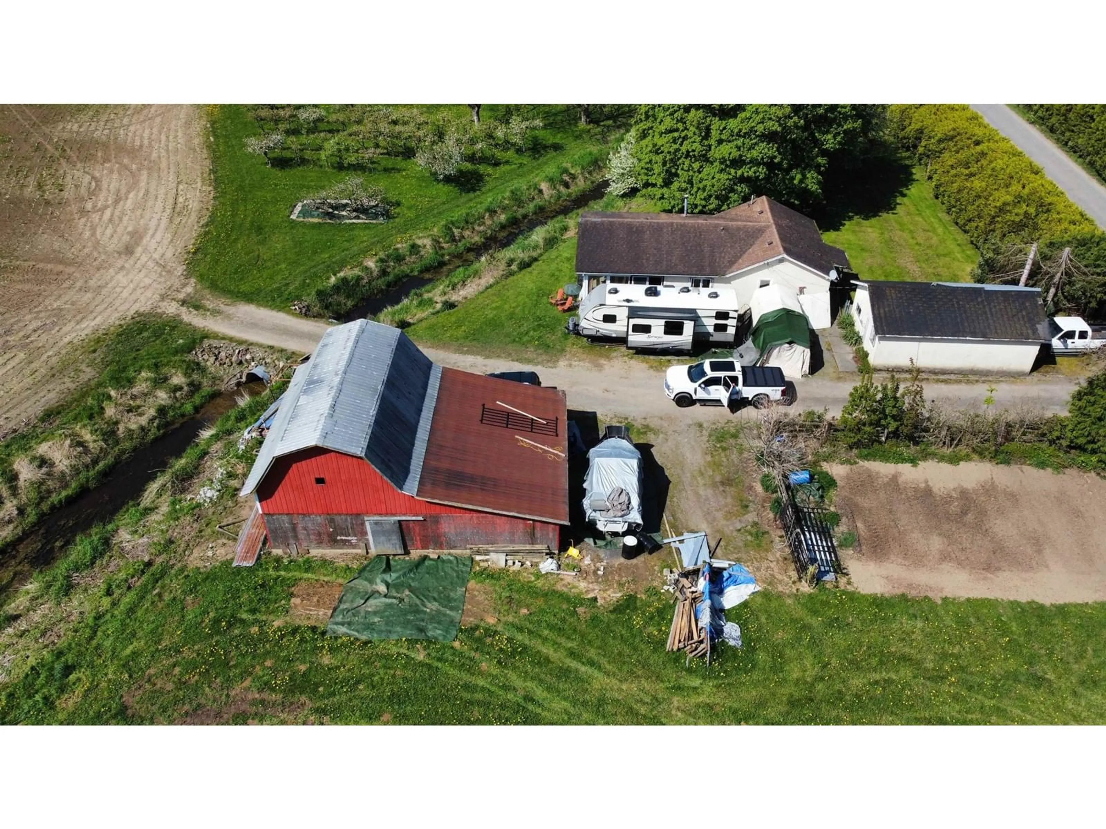 A pic from outside/outdoor area/front of a property/back of a property/a pic from drone, building for 5970 MCCALLUM ROAD, Agassiz British Columbia V0M1A3